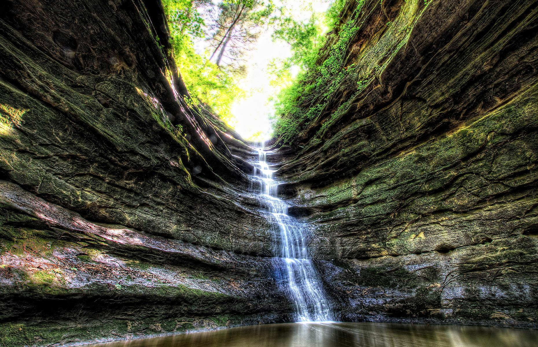 <p>As the name might suggest, this park's winning feature is its dramatic rock formations. Starved Rock State Park is home to a total of 18 canyons, with waterfalls forming during springtime and after heavy rain. Its web of trails reaches across 13 miles (21km) and takes hikers past rocky gorges, wildflower-filled meadows and, in the winter, ice sculptures formed from frozen watery cascades. Now discover <a href="https://www.loveexploring.com/galleries/86372/the-most-beautiful-state-park-in-every-us-state?page=1">the most beautiful state park near you.</a></p>