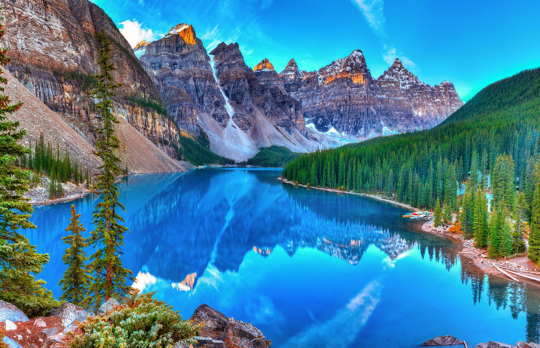 <p>Alberta's Banff National Park is chock-full of gorgeous lakes, from the park's most famous, Lake Louise, to the incredible turquoise expanses of Peyto Lake and Moraine Lake (pictured). Most lakes here get their distinctive blue color from the reflective glacial silt that makes its way into the water. Situated in the Valley of the Ten Peaks, the lake sits at an elevation of about 6,181 feet (1,884m) and has a surface area of 120 acres. Take a look at <a href="https://www.loveexploring.com/galleries/93757/stunning-images-of-canadas-jaw-dropping-natural-wonders?page=1">stunning images of Canada's jaw-dropping natural wonders</a>.</p>