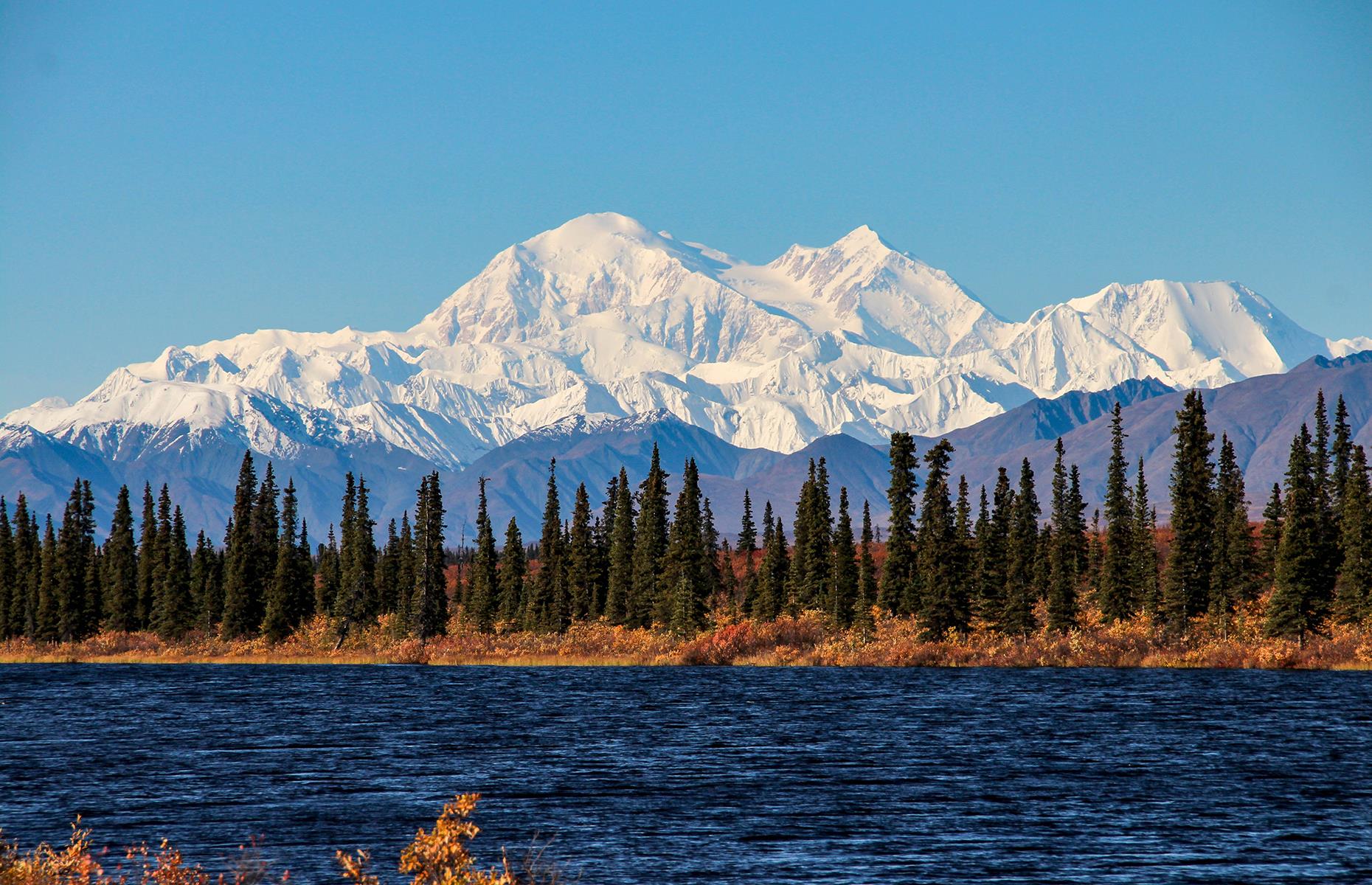 Slide 30 of 41: It's hard to pick the most beautiful spot in such an incredible national park like Denali but if we had to name one, it would be the scenery that unravels at Wonder Lake and the nearby Reflection Pond. Created by retreating glaciers, the lake offers a picture-perfect setting, framing the Denali mountain (formerly Mount McKinley) – the highest mountain in North America.
