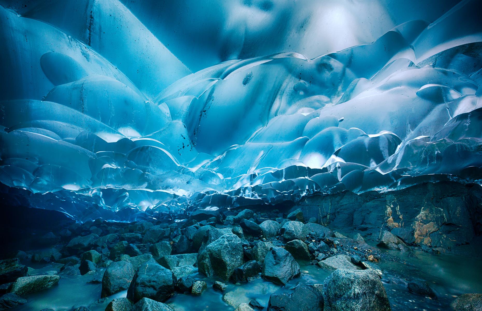 Slide 18 of 41: Some 12 miles (19km) from Alaska's state capital Juneau are these unusual cool blue caves. They're carved deep through the Mendenhall Glacier and reaching them is no easy feat. Adventurers must hike across a vast ice field, often scrambling over slippery rock faces on the approach. The ethereal caves are worth the effort though. Sadly, the glacier is receding at a rapid pace, meaning the caves might not last much longer.