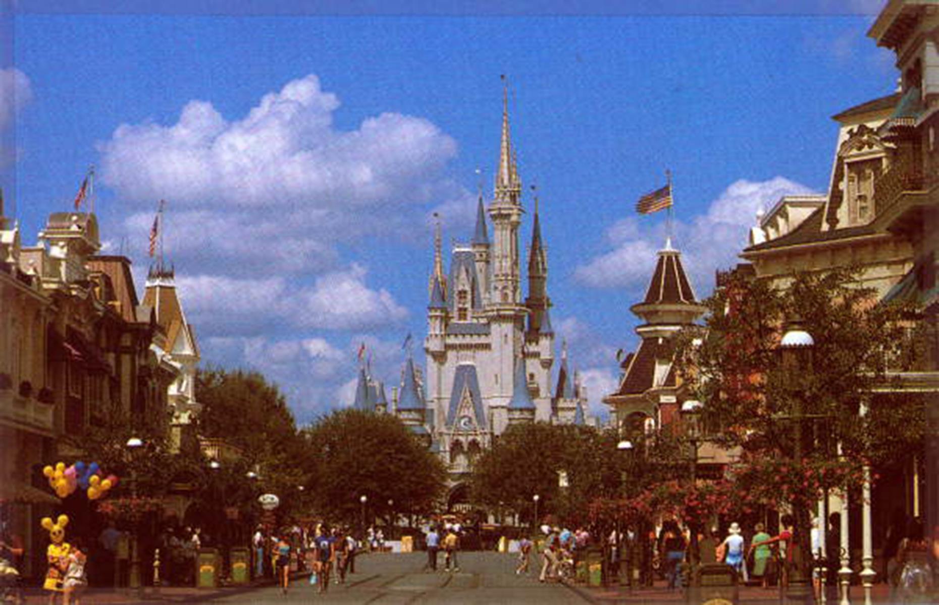 Slide 34 of 35: Probably the most popular theme park in the world (Disney doesn't release any official visitor numbers) Walt Disney World Florida actually came after its Californian cousin. The Floridian park opened its gates in 1971 and, just like in California, the castle – this time belonging to Cinderella – soon became a symbol of the park. Here eager visitors wander up Main Street U.S.A in the site’s early days.
