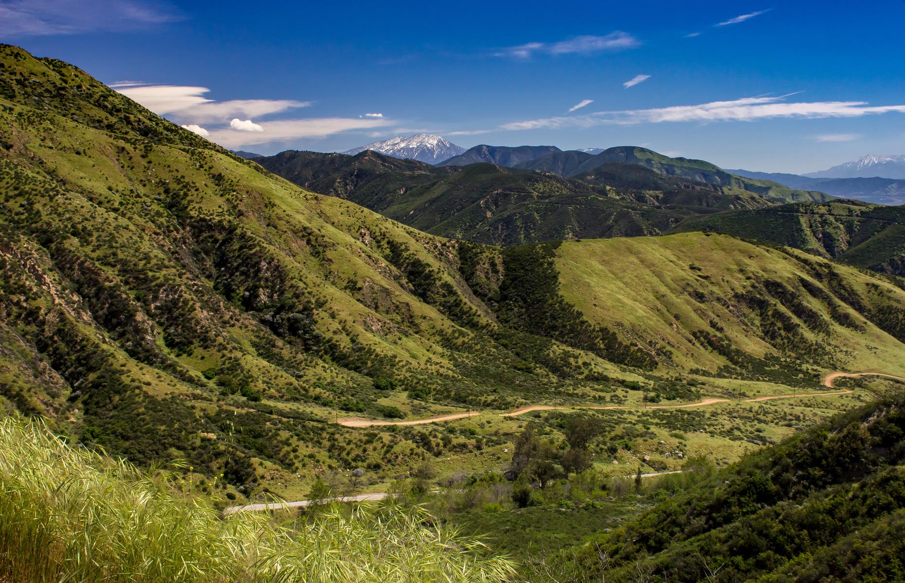 <p>If this sounds like an overly dramatic name, you’ll realize it’s pretty well justified once you start this road trip through the Inland Empire. The <a href="https://www.visitcalifornia.com/attraction/road-trip-inland-empires-rim-world">Rim of the World Scenic Byway</a> is so-named because it slices through the San Bernardino Mountains, opening up views over lakes and forests strewn with granite boulders. It ends near Big Bear Lake, a popular winter playground that’s equally glorious in the other, quieter seasons. <a href="https://www.loveexploring.com/galleries/97470/most-beautiful-scenic-byway-in-every-state?page=1">Take a look at the most beautiful byway in every state</a>.</p>