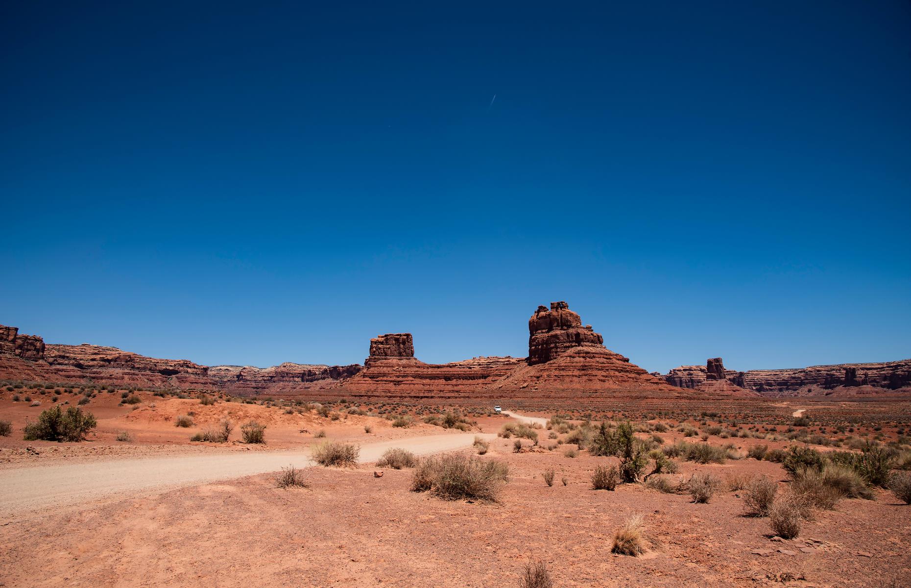 <p>A 17-mile (27km) dirt and gravel road loops through the <a href="https://utah.com/monument-valley/valley-of-the-gods">Valley of the Gods</a>, passing flat-topped buttes and spindly spires and rewarding road-trippers with views of apricot, peach and rose-tinged rock that stretch for miles. The road is bumpy and steep in places, so you may need a 4x4 in wet conditions. Otherwise, just take a full tank of petrol, some snacks and a sense of adventure.</p>