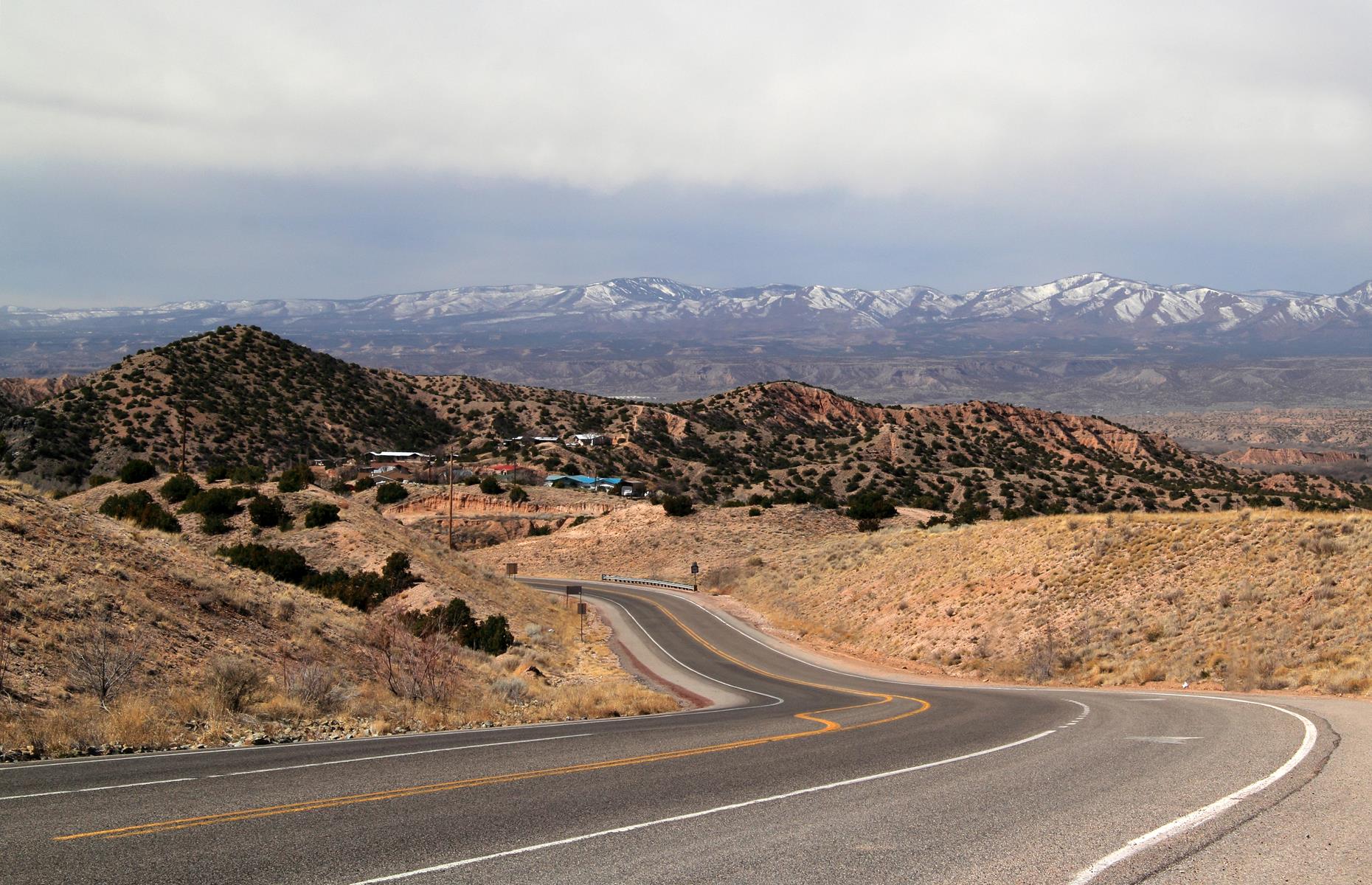 <p>You can take the High Road and the Low Road on this <a href="https://santafe.org/Visiting_Santa_Fe/Things_to_Do/Road_Trips/Taos_and_the_High_Road/">165-mile (266km) round trip</a> from Santa Fe to Taos. Start on the elevated portion, which wiggles its way through forest and open stretches with incredible views of the Jemez Mountains. The Low Road, looping back from Taos, takes you down to the banks of the Rio Grande and through a narrow canyon.</p>