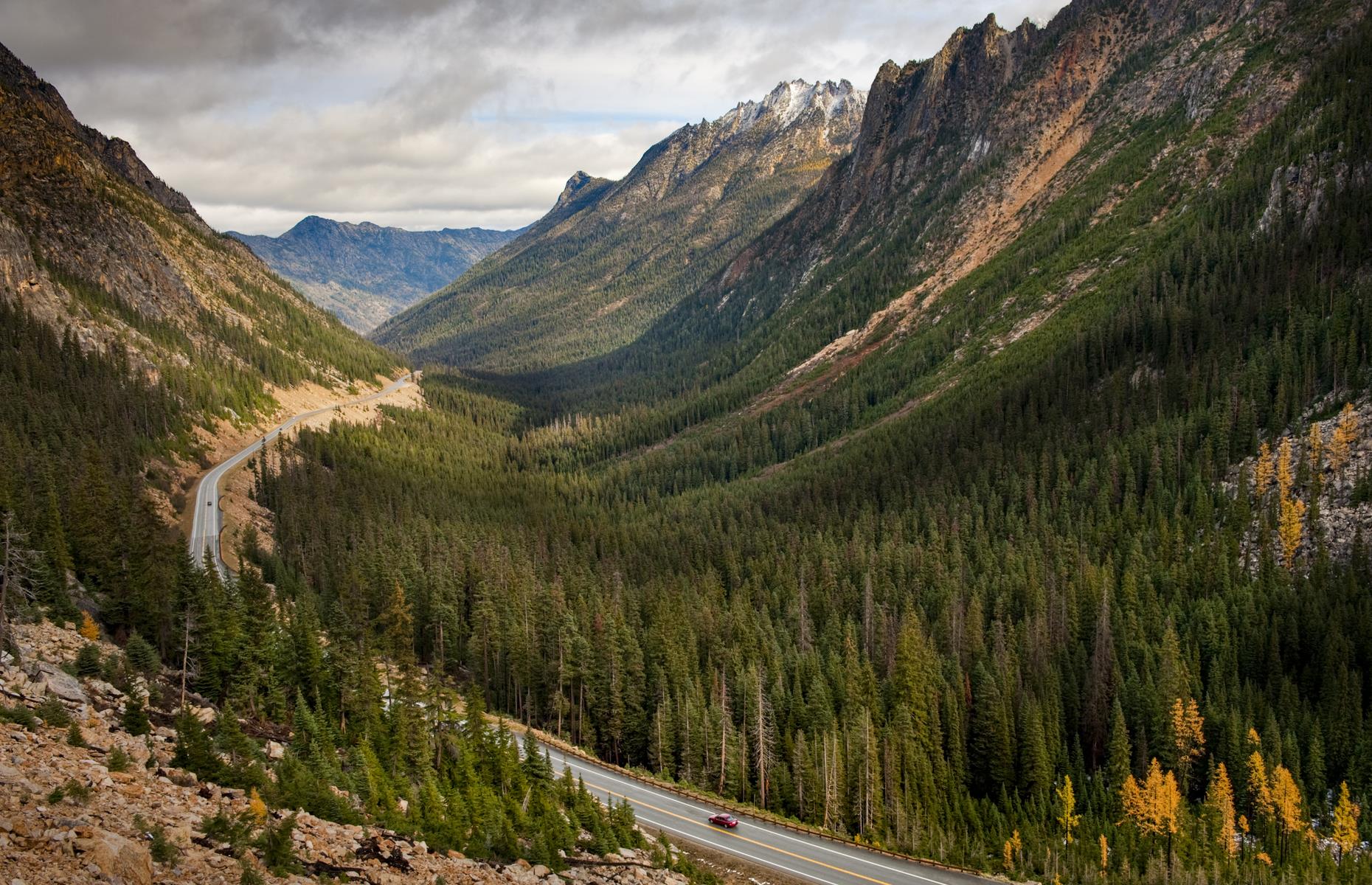 <p>You could be forgiven for thinking you’ve ended up in the Alps as you drive <a href="https://www.cascadeloop.com">this 440-mile loop</a>. There’s Leavenworth, a Bavarian-style town whose picture-perfect thatched houses are backed by mountains, crystalline lakes, verdant valleys (brightened by tulips in spring), pine-studded slopes, and cute wooden huts selling ice-cream and cakes. The southern part skims by the Skykomish River before the route slices east through the Methow Valley, nicknamed Washington’s wild west.</p>