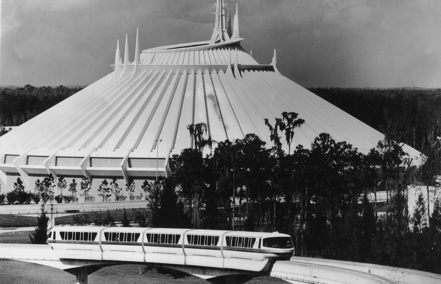 Slide 27 of 38: Remaining one of Disney's most popular rides, Space Mountain debuted in 1975, around four years after Magic Kingdom's opening. An indoor, space-themed roller coaster, it was extremely hi-tech for its day, with guests riding in the dark and enjoying stunning projections of stars and planets. Now the cosmic attraction has a place in Disney parks around the globe.