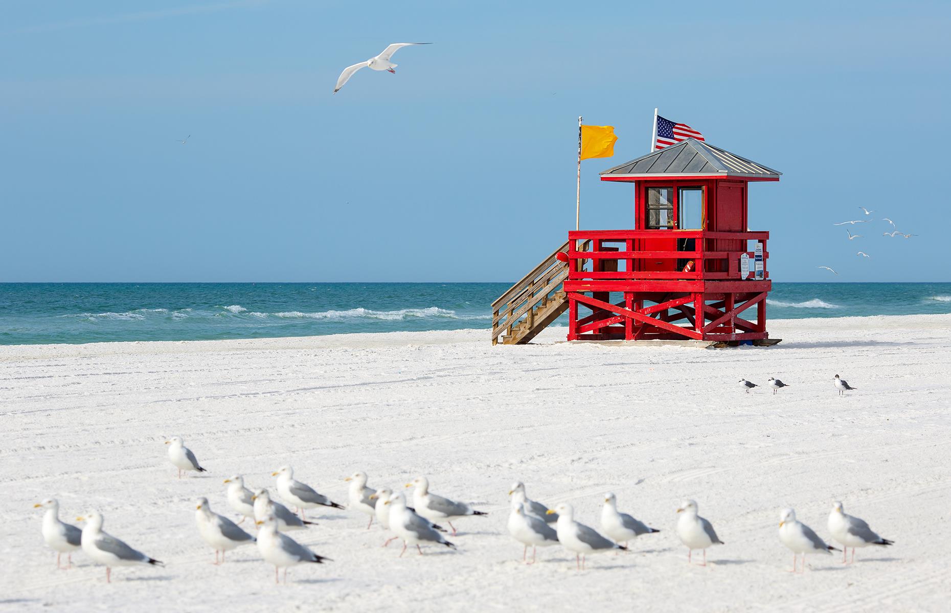 <p>Off the coast of Sarasota in western Florida, Siesta Key is a barrier island that resembles the Caribbean more than it does the USA. Best known for its impeccable white-sand beach that's often recognized among the best in America, it's a brilliant destination for a relaxing family holiday, thanks to the shallow, calm waters and the wide range of accommodation available. A short stroll from the beach lies Siesta Key Village – a top destination for outdoor dining, cafés and shopping. <a href="https://floridahealthcovid19.gov/travelers/">Check the latest travel information here</a>.</p>