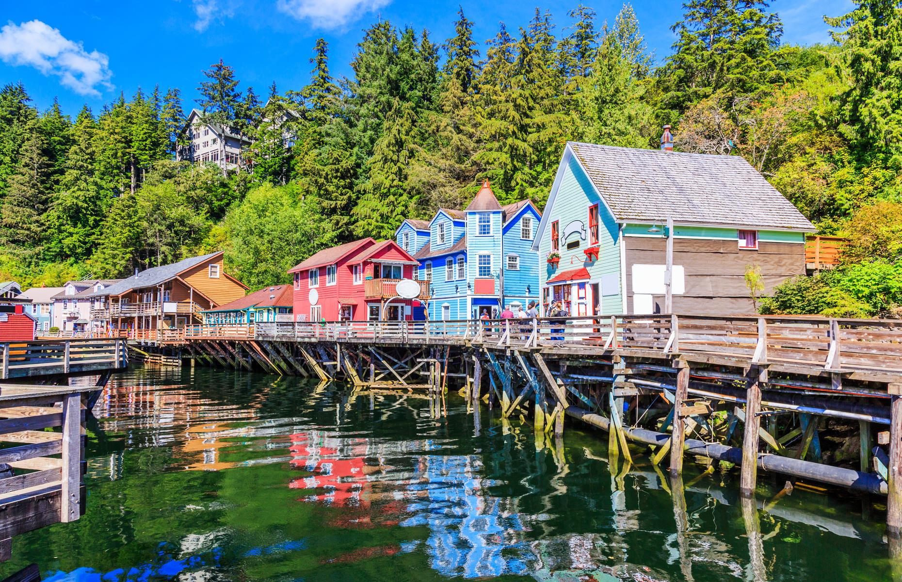 <p>In the far south of the USA’s most northerly state is Ketchikan, centered on a small cluster of colorful clapboard stilt houses perched over Ketchikan Creek. The city is known for its indigenous (mostly Tlingit and Haida) heritage and is the best place in the country to see intricately carved and brightly painted totem poles in their intended environment. And what an environment it is, with lush green forests, glacier-carved valleys and looming mountains just outside the city. <a href="https://covid19.alaska.gov/travelers/">Here's everything you need to know</a> if you're traveling to Alaska from another state.</p>