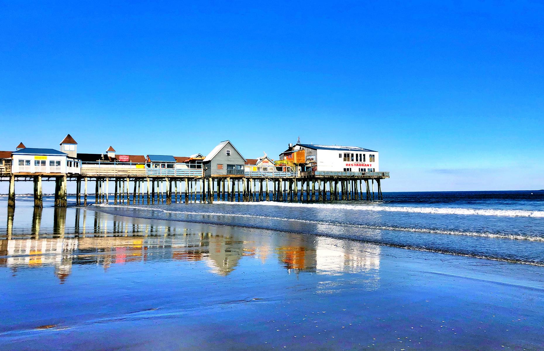 <p>With seven miles (11km) of pristine beach and <a href="https://www.palaceplayland.com/">a beachfront amusement park</a>, Old Orchard Beach in Maine is brilliant for a family escape. Simply enjoy time on the beach, take in the stunning New England scenery from atop the Ferris wheel, or explore its adorable pier. Once the sun sets, the town is dotted with lively restaurants and bars serving only the best lobster in Maine. <a href="https://www.mainetourism.com/travel-resources-covid-19/">Check the latest travel information</a> before planning a trip. </p>