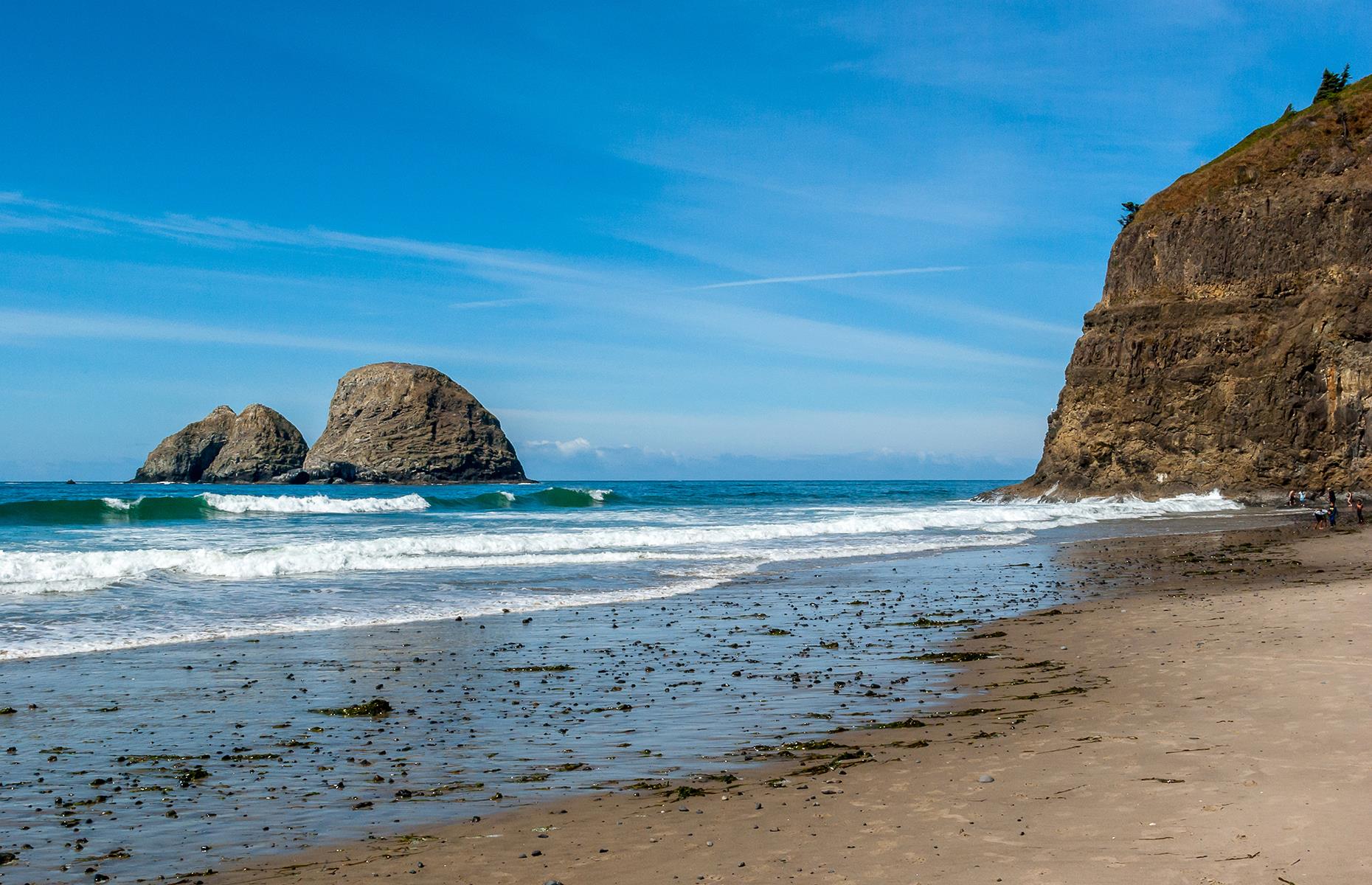 <p>Dubbed as the place where 'mountains meet the sea', Rockaway Beach is surrounded by incredible natural beauty, namely the Twin Rocks (pictured). Once you've spent time on the beach, check out the <a href="https://stateparks.oregon.gov/index.cfm?do=park.profile&parkId=131">Cape Meares State Scenic Viewpoint</a>, as well as the lighthouse (temporarily closed), then head into town. During summer, the nearby <a href="https://www.tillamook.com/creamery.html#general">Tillamook Creamery</a> is the place to visit for its ice cream and cheese, while in winter you'll get to enjoy the fresh crab fishermen harvest in December. </p>
