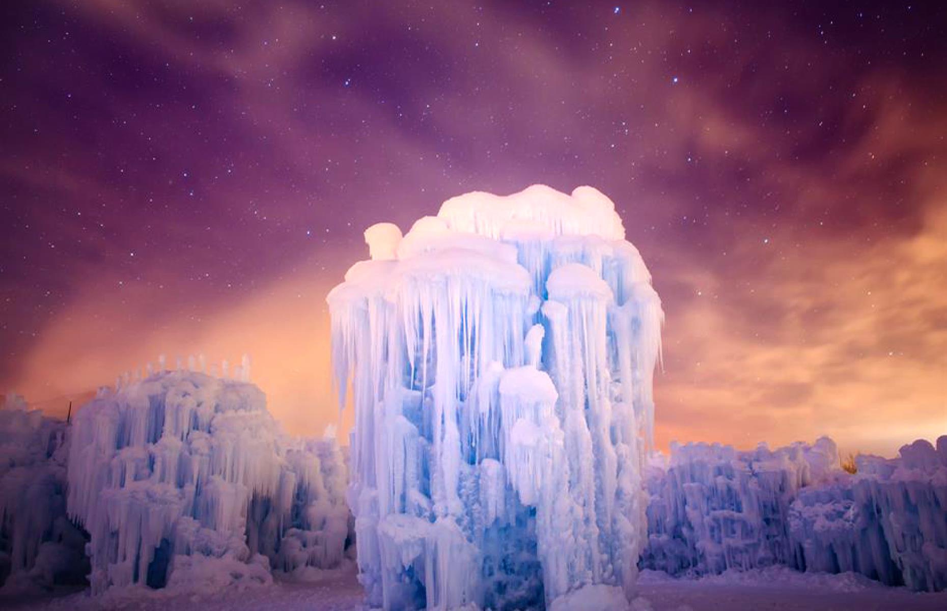 Slide 15 of 100: These stunning ice castles pop up seasonally in Utah, Wisconsin, Minnesota, New Hampshire and Colorado. They're actually man-made, conjured up from thousands of icicles, then illuminated with LED lights. The result is a series of sparkling ice palaces, complete with glowing tunnels, archways, caverns and even thrones. Discover more stunning images of snow and ice festivals across the world here.