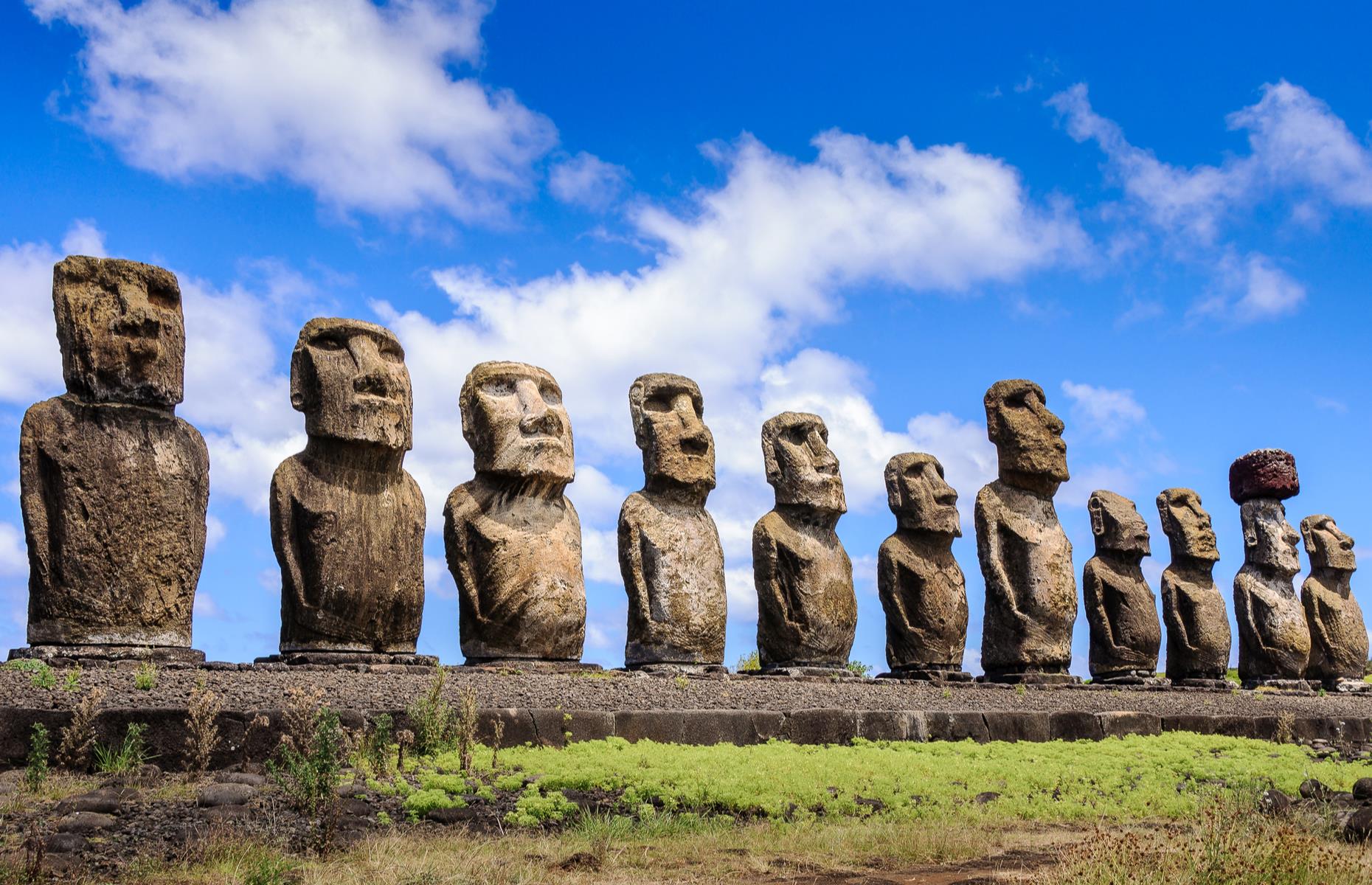 Slide 34 of 50: The Chilean territory of Easter Island is famed for its gargantuan stone statues, or moai. There are hundreds of these somber stone heads and torsos dotted across the isle, and while the exact date of their origin is unconfirmed, estimates usually fall between AD 1,050 and 1,680. The real mystery, though, is why these monuments were erected in the first place. But after years of deliberation, some scientists think they have the answers. By carefully mapping the moai's positions, experts found a correlation between the statues' locations and the presence of fresh water.