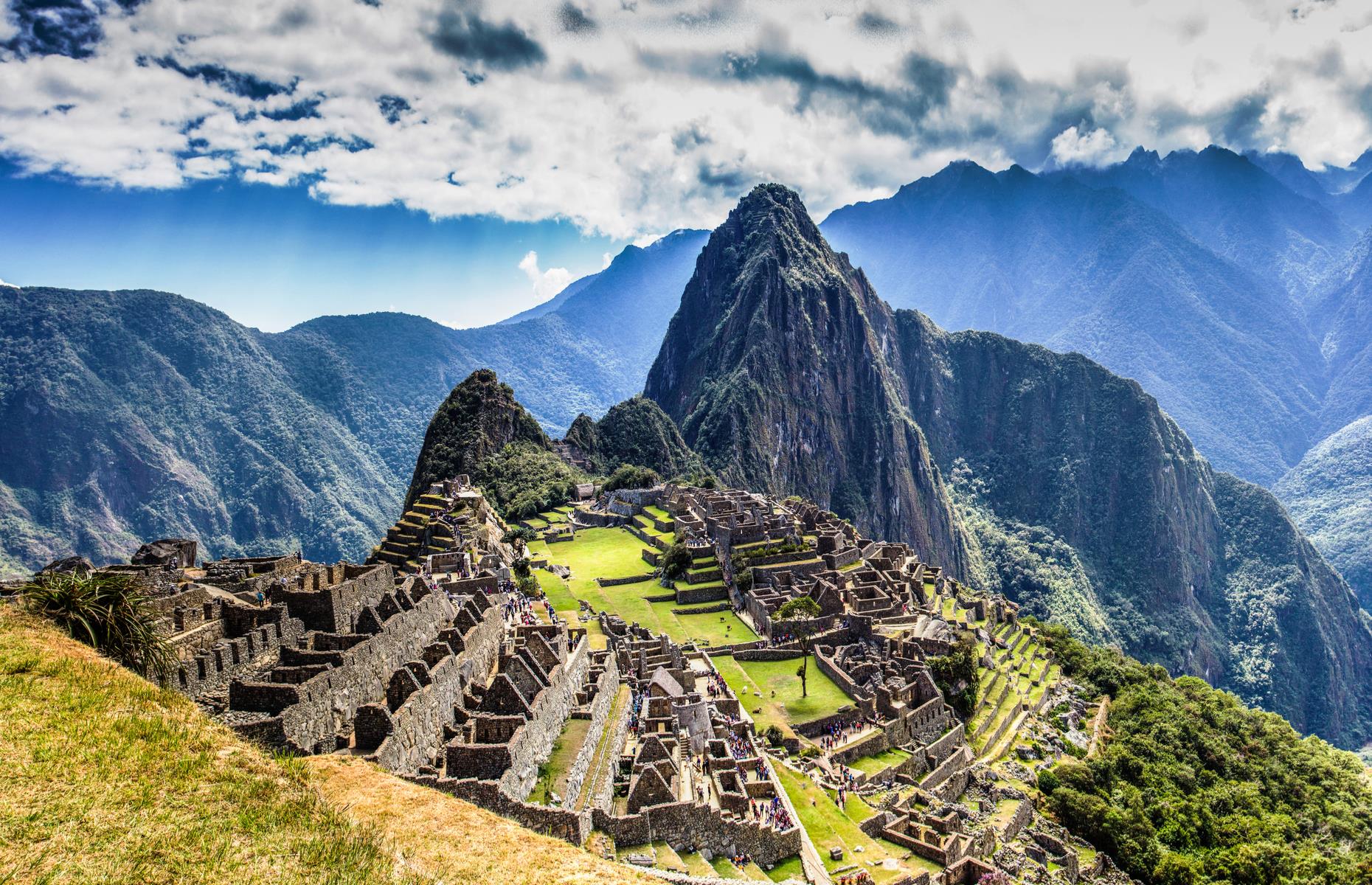 Slide 22 of 50: Tucked away in the Andes Mountains, the Inca ruins of Machu Picchu remain one of the world's most lauded historic sites. More than half a million people usually journey here each year, often following the fabled Inca Trail. But the ancient site, built around the mid-15th century and made up of temples, plazas and a royal palace, has suffered under the weight of the huge visitor numbers. New restrictions were imposed in 2017 as a result, but still fascination with this ancient wonder is far from waning.