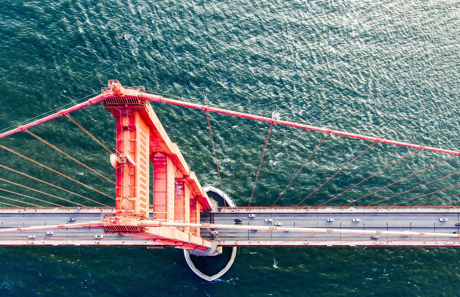 Slide 42 of 45: One of the most recognizable landmarks in the USA, San Francisco's Golden Gate Bridge looks pretty spectacular from any angle. But when captured from above you can truly admire the sheer scale and ingenuity of the structure. Its towers rise to 746 feet (227m) and its orange-red expanse stretches right across the San Francisco Bay.