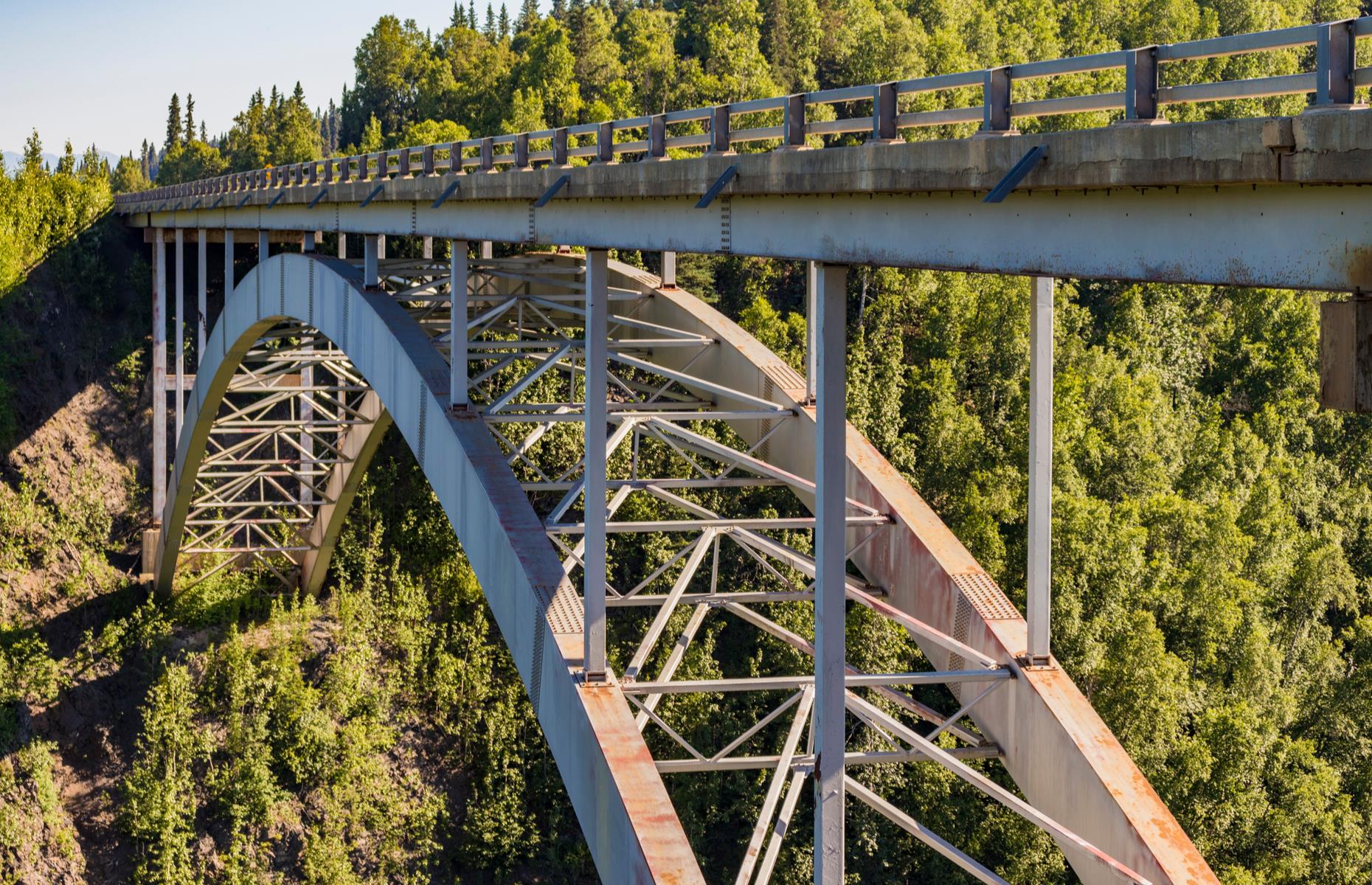 Slide 3 of 52: The hair-raising Hurricane Gulch Bridge rises some 296 feet (90m) above the Hurricane Creek in southern Alaska and spreads out for a whopping 918 feet (85m), making it the longest and tallest bridge on the Alaska Railroad. When it was erected in 1921, it was considered a true wonder of engineering and remains a head-turning sight today.