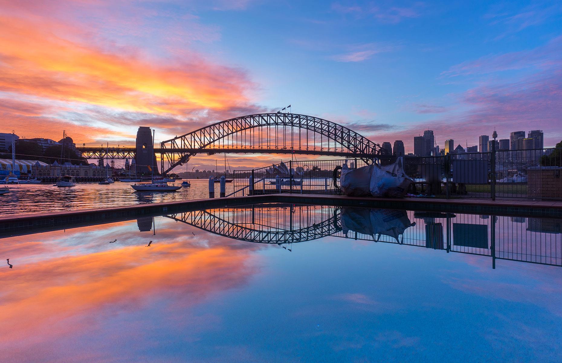 <p>There's no better time for a panoramic photograph of the Sydney Harbour Bridge than sunrise, but it's also possible to admire the dawn from the top of the bridge on a special tour on the first and the third Saturday of the month from October to May, and the first Saturday of every month from June to September. From here you’ll see views across the city as well as the Sydney Opera House. Check out the <a href="https://www.bridgeclimb.com/covid-19-health-and-safety-at-bridgeclimb">COVID-19 safety procedures and the latest booking information here</a>.</p>