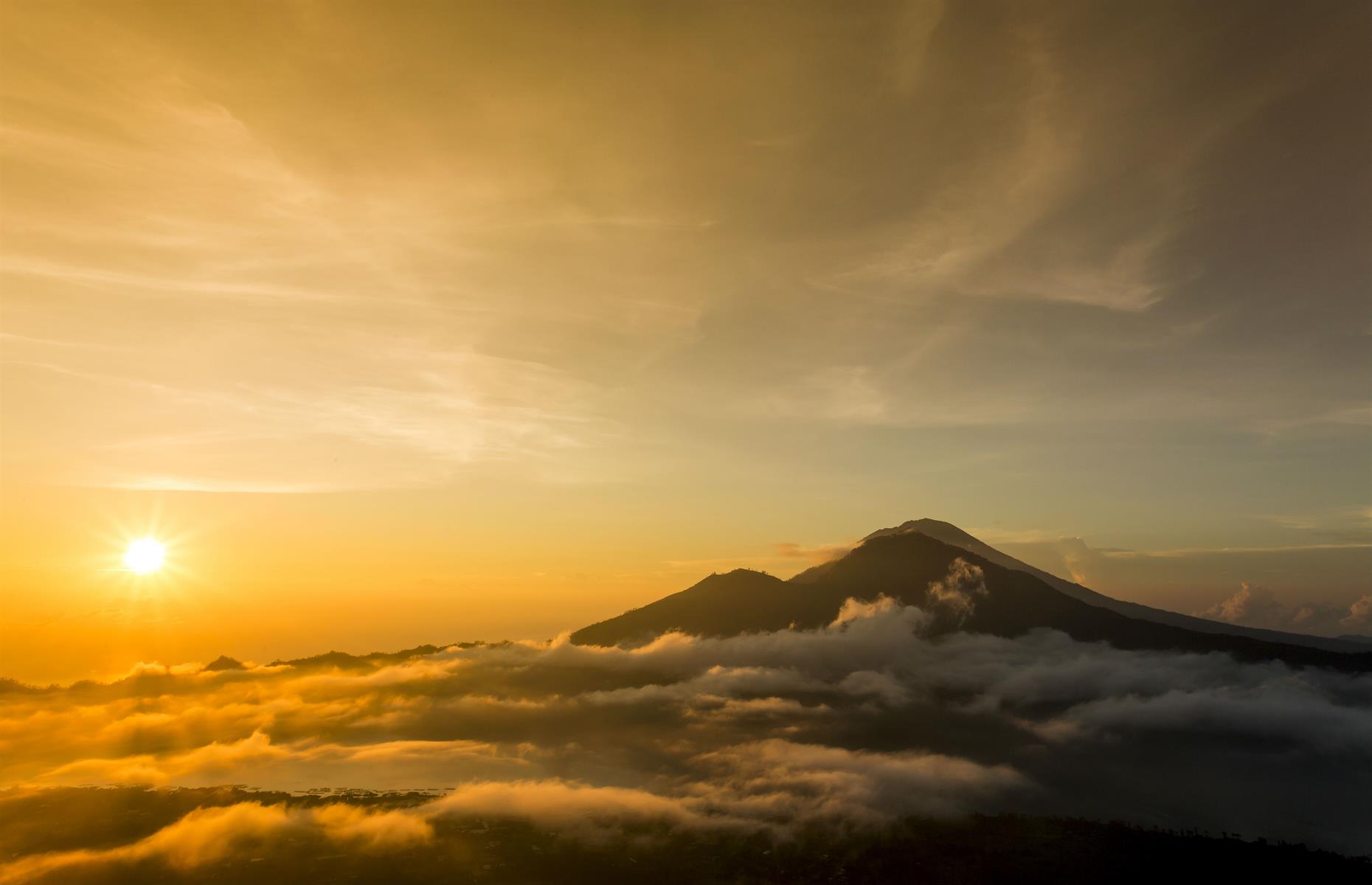 <p>Anyone who is moderately fit should be able to take on Mount Batur in Bali and witness the sun rising against the silhouette of neighboring Mount Agung. Typically tours start at 2am from the town of Ubud, but the climb itself is a pleasant and steady two hours. It's ideal for anyone who enjoys hiking and rewards you with one of the most dazzling sunrises you'll ever see. Currently Bali's airports are open for domestic tourism only, with the hope some international visitors can return from September. </p>