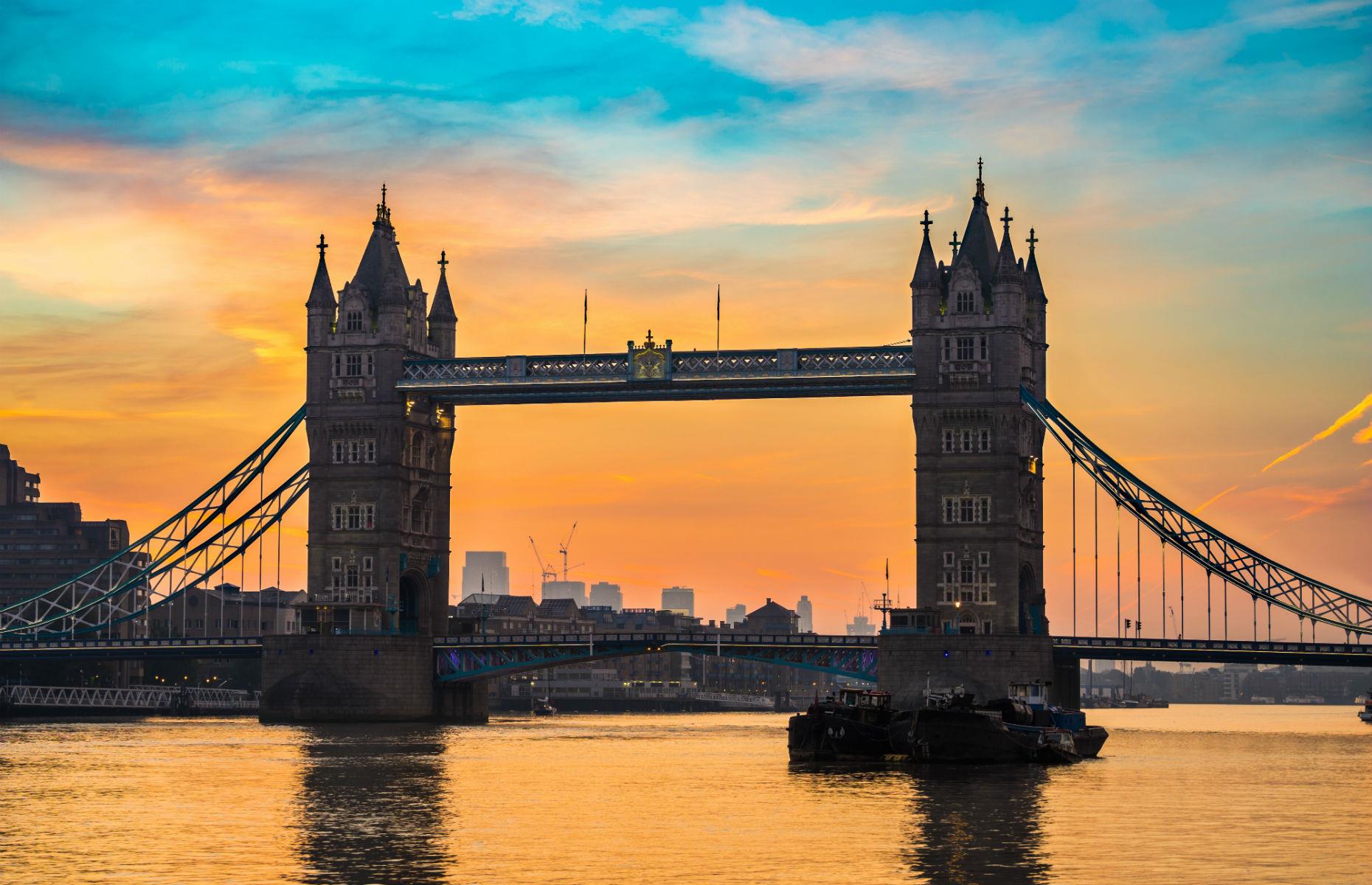 Witness London before most of the UK capital wakes up and watch the sunrise over one of its most iconic landmarks, Tower Bridge. The early morning sun over East London streaks the sky with vibrant shades of orange and yellow which reflect in the surrounding glass buildings. It's a rare moment of peace in the hectic metropolis and neighboring London Bridge to the west is one of the best vantage points.