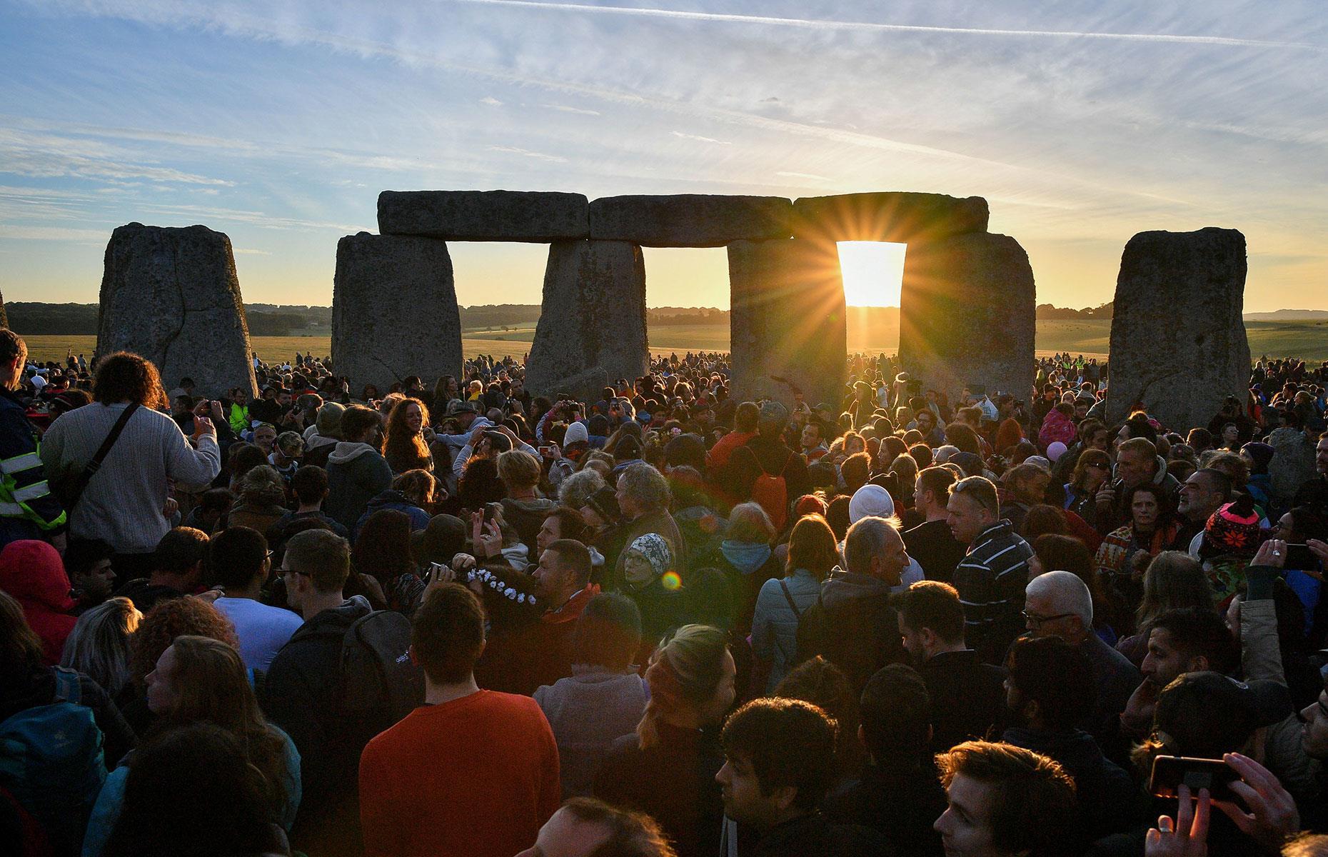 <p>For thousands of years people have been gathering at Stonehenge – an ancient circle of stones in Wiltshire, England – to mark the Summer Solstice in the northern hemisphere – when the sun travels its longest path through the sky. It's believed the stones, possibly built as a temple, were constructed to align with the rising sun of the Summer and Winter Solstices. Up to 20,000 people assemble to watch the special sunrise over the Heel Stone in mid-summer, although in 2020 the celebrations were taken online. </p>  <p><strong>READ MORE: <a href="https://www.loveexploring.com/galleries/74216/summer-solstice-stonehenge-longest-day-of-the-year-2020?page=1">Stunning pictures of Summer Solstice traditions around the world</a></strong></p>