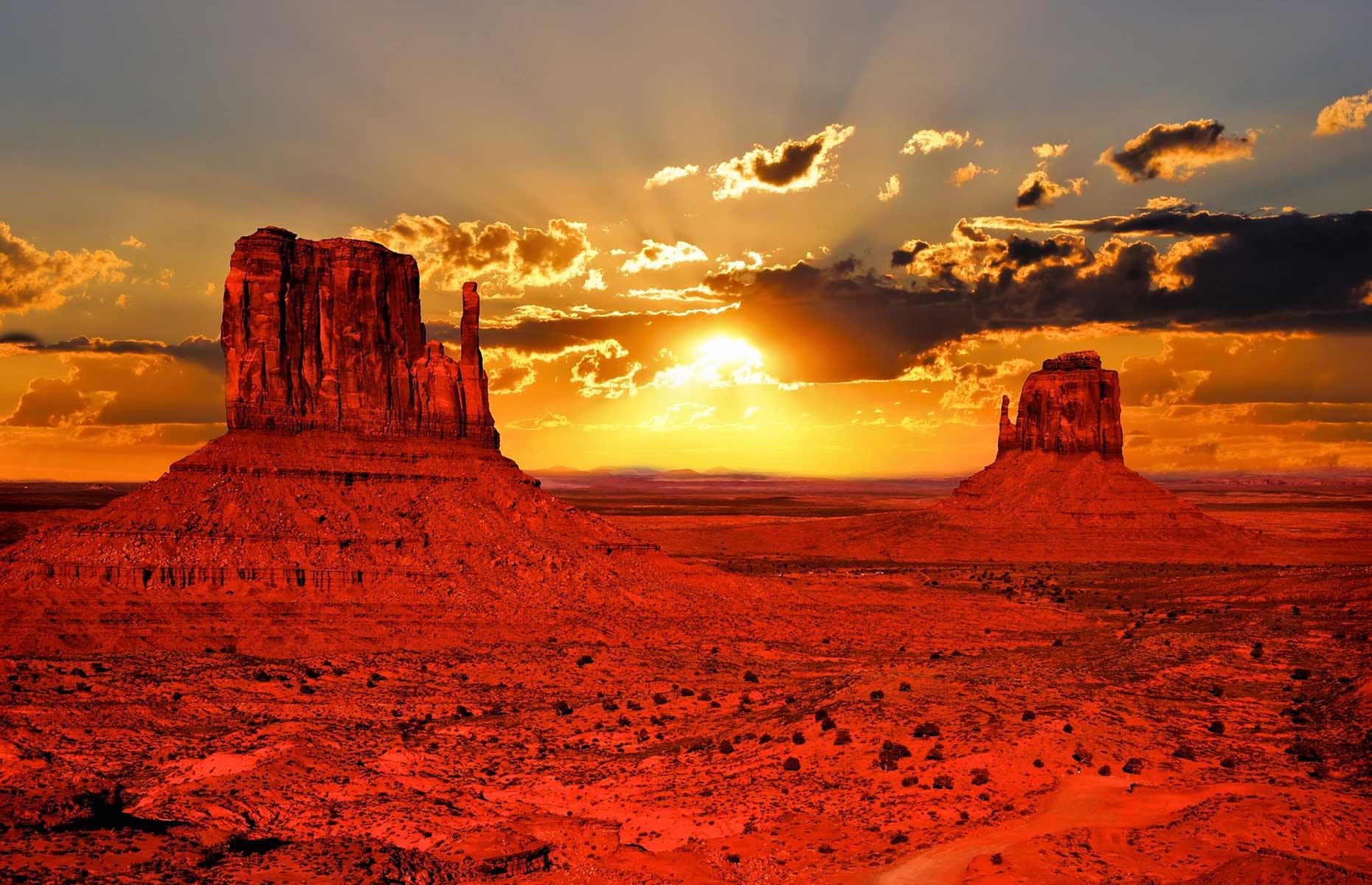 <p>Lying on the Arizona-Utah border, Monument Valley's been the backdrop to many Western movies such as <em>Stagecoach</em> and <em>The Lone Ranger</em>. But it's best seen in real life at sunrise, when bathed in warm light, highlighting the red-sand desert. Usually you can enjoy a self-drive loop around the most beautiful spots, which takes around three hours but the park is currently closed so <a href="https://navajonationparks.org/tribal-parks/monument-valley/">do check for opening times</a>. </p>