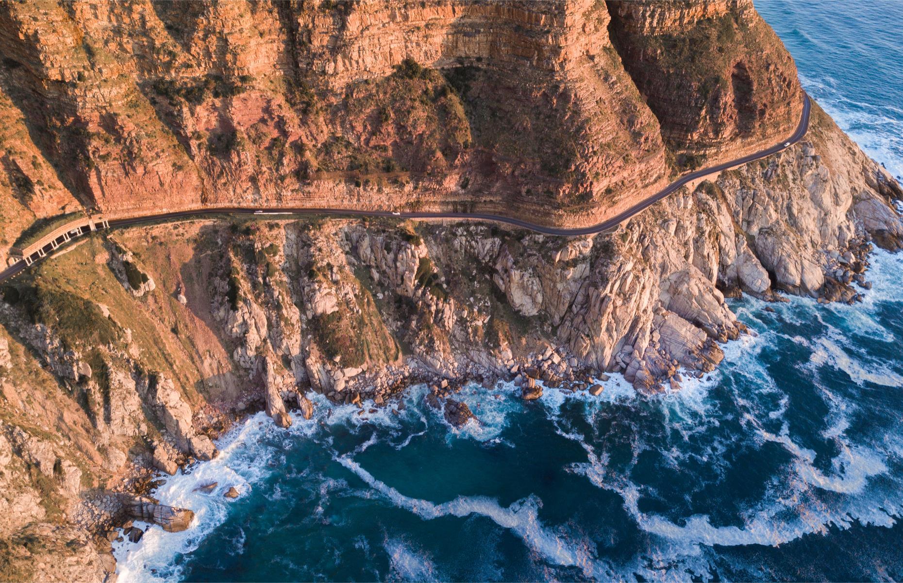 <p>Carved out of the steep and towering cliffs, this impressive roadway hugs an extraordinarily beautiful stretch of Atlantic coastline between Noordhoek and Hout Bay in Cape Town. It was constructed between 1915 and 1922 by convicts. Known as Chappies by locals, the toll road has plenty of places to pull over to stop and enjoy the dramatic views, picnic or spot passing whales. For another great South African drive see our <a href="https://www.loveexploring.com/guides/65670/the-garden-route-south-africa">guide to the Garden Route</a>.</p>