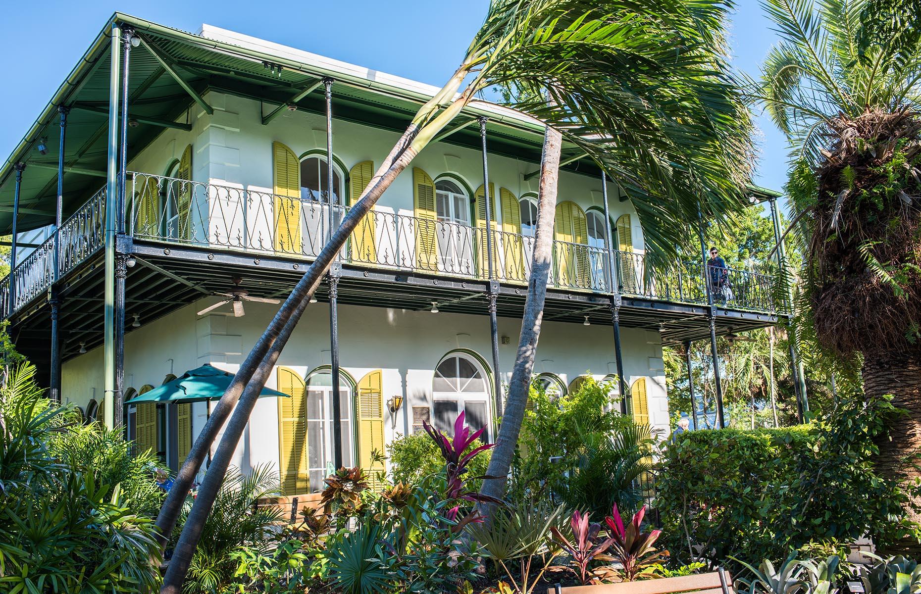 <p>The late American writer Ernest Hemingway lived in this Key West home between 1931 and 1940 and the house remains a tribute to him and his work. It’s a graceful, Spanish-inspired building, with much of the novelist's 17th- and 18th-century furniture on display inside. The study where Hemingway worked is also beautifully preserved, capturing the environment as it was when he penned some of his best work, including the short story classic <em>The Snows of Kilimanjaro</em> and his novel <em>To Have And Have Not</em>.</p>