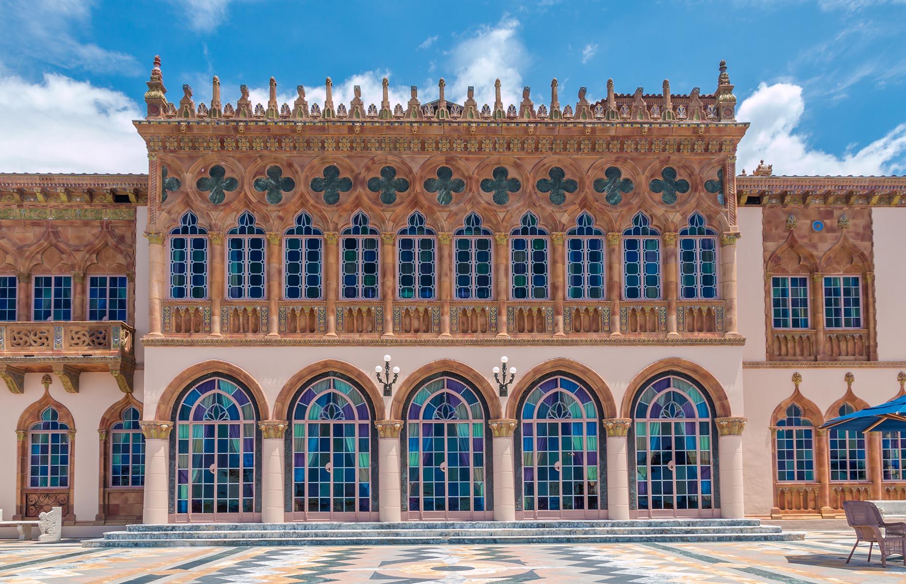 One glimpse at this sprawling villa and you might think you’ve been transported to the Mediterranean. This salmon pink and terracotta feat was inspired by some of Venice’s most impressive buildings. It was the vision of the eccentric circus master John Ringling and his wife Mable, and construction began in 1924, led by New York architect Dwight James Baum. Just 41 rooms and 15 bathrooms later glittering Cà d’Zan was born.