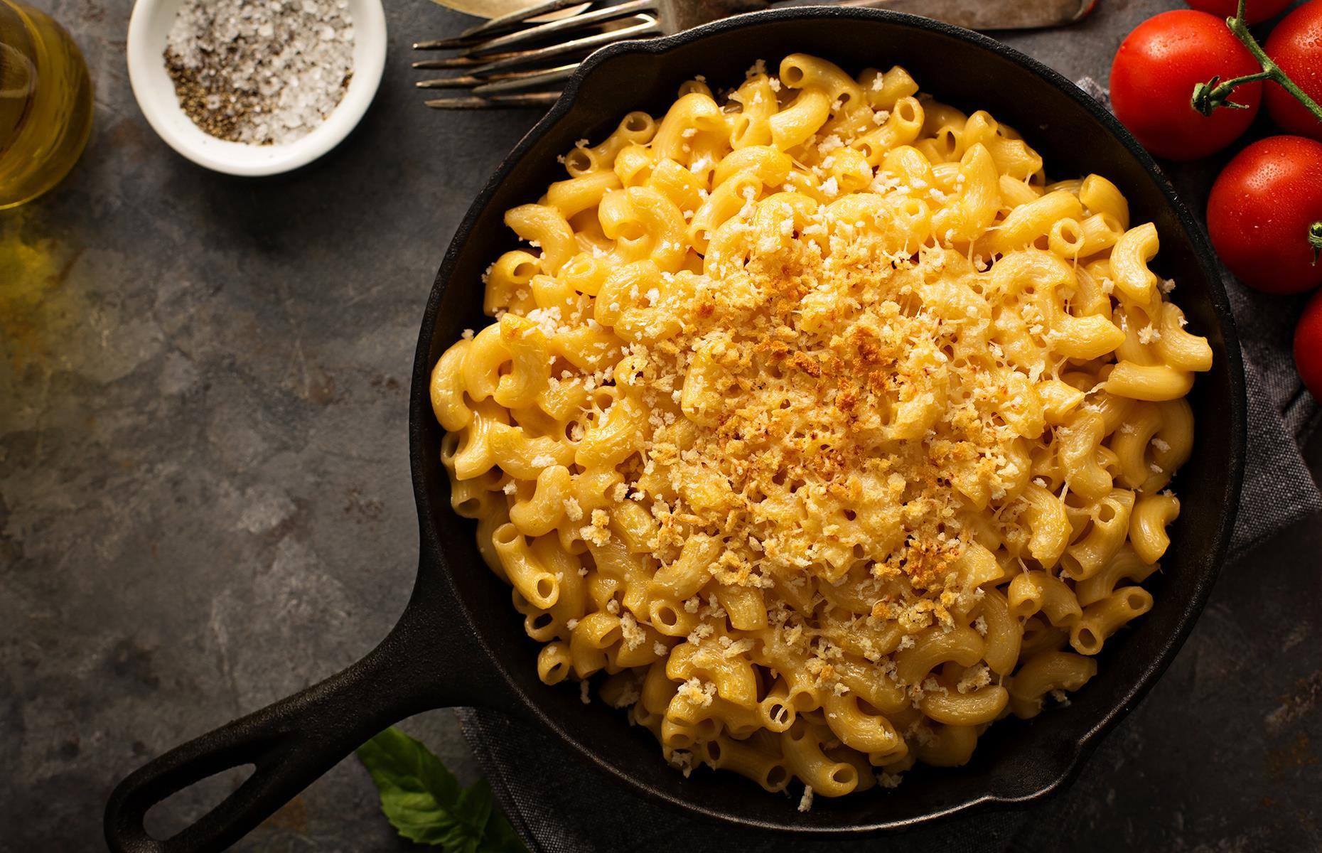 Often overlooked, breadcrumbs are just as important as the pasta, the cheese and the sauce to make the perfect mac 'n' cheese. The trick to achieving the perfect crispy topping is to toast the breadcrumbs before they go in the oven. Melt butter in a skillet over a medium heat, add panko breadcrumbs and toast until they turn a light golden brown.