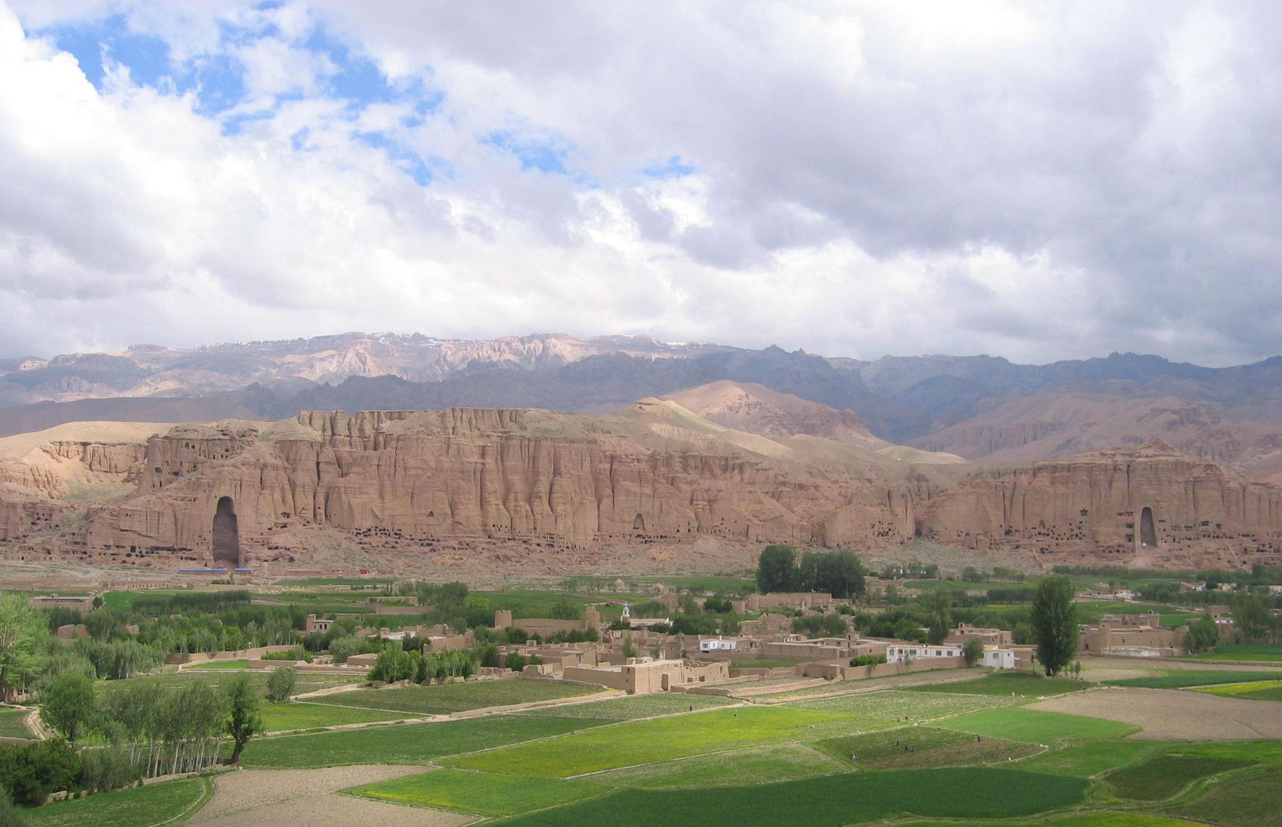 Slide 2 of 53: The archaeological remains of the Bamiyan Valley, containing fortified buildings from the Islamic period as well as Buddhist monastic ensembles and sanctuaries, are one of Afghanistan's most significant sites. However, the area has been shaken by political unrest and terrorism; in 2001 the two standing Buddha statues – formerly the largest standing Buddha carvings in the world – were destroyed by the Taliban. In 2007, two more attacks severely damaged an ancient rock carving of a seated Buddha.