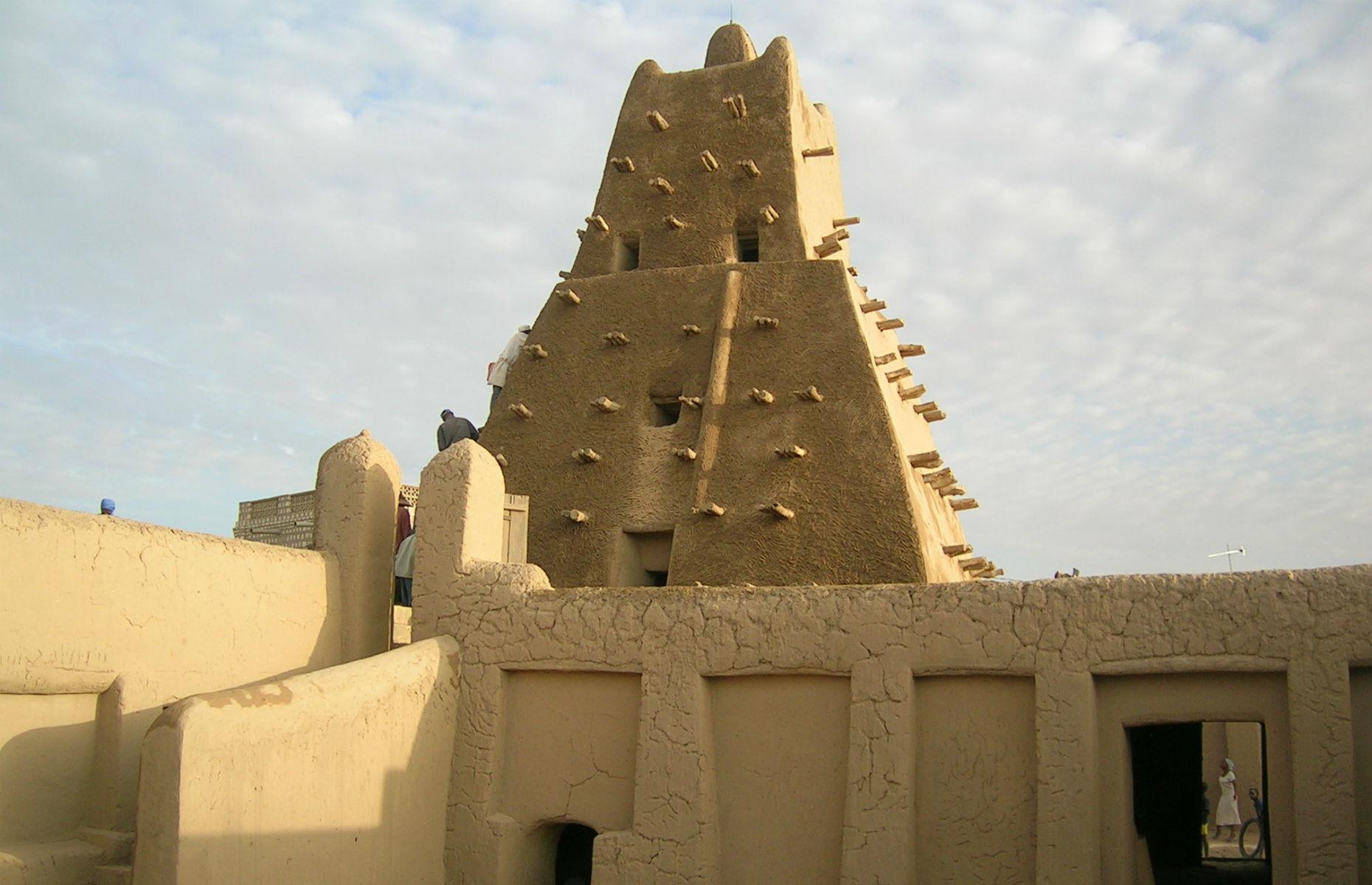 Slide 29 of 53: Timbuktu is one of Africa’s most historically significant cities: home to the Koranic Sankore University and other madrasas, Timbuktu was an intellectual and spiritual capital, and was also central to the promotion of Islam in Africa in the 15th and 16th centuries. Its three great mosques are said to “recall Timbuktu's golden age”. However, despite being continuously restored, these monuments are under threat: armed conflict in the region, illegal trafficking of cultural objects by looters and dealers, and suicide bombings are just some of the dangers that Timbuktu faces.