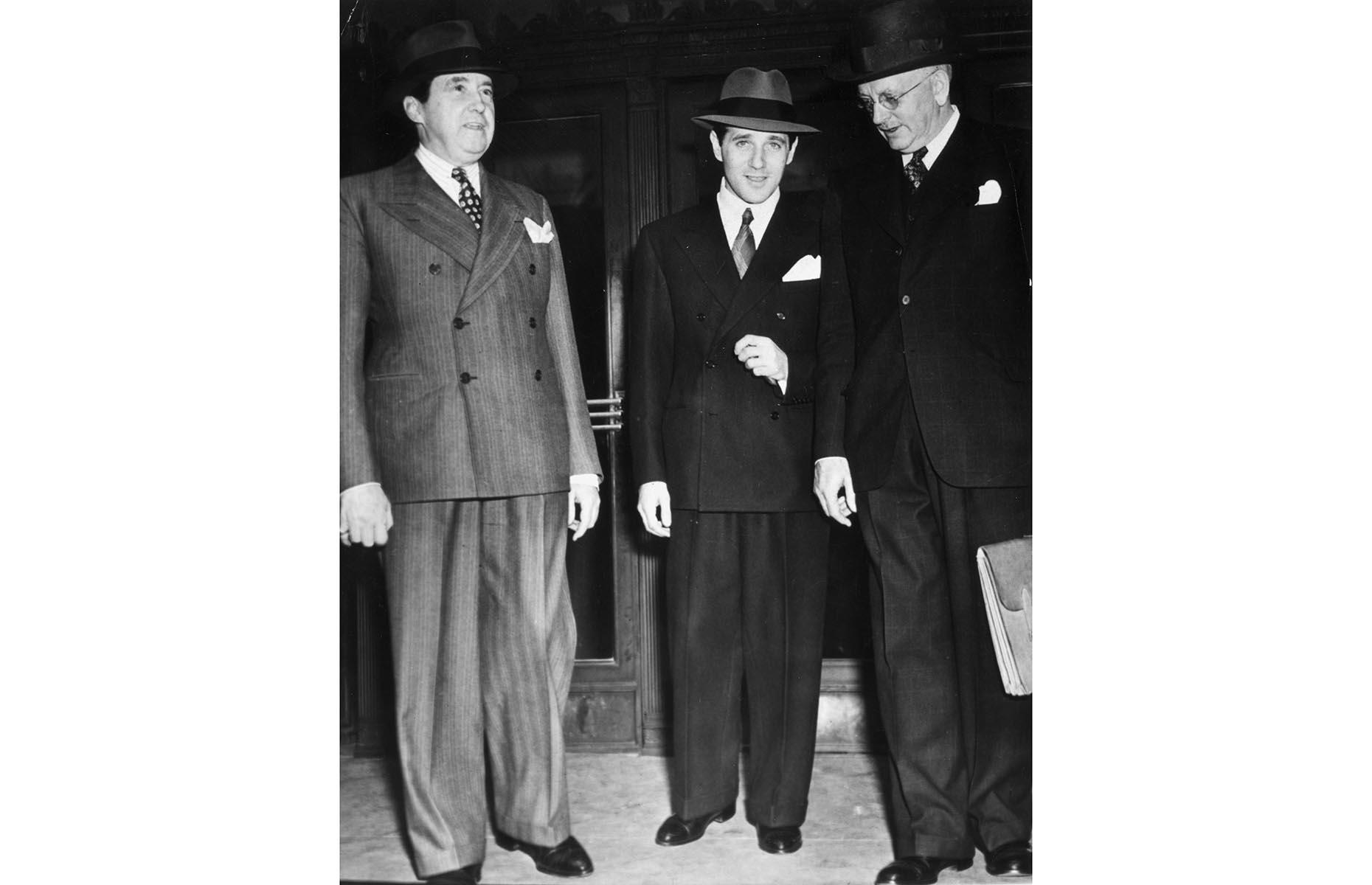 Slide 13 of 34: An extremely attractive location for organized crime, Las Vegas quickly became a city run by the mob. Rich on cash made from bootlegging spirits during Prohibition, some of the biggest names in the mob history all came to Las Vegas – Frank Costello, Lucky Luciano and Benjamin "Bugsy" Siegel (pictured center) all played a key role in the development of the Las Vegas Strip. Their fortunes quickly ran out though. By the late 1950s, the newly established Nevada Gaming Commission began to curtail the freedom of these gangsters. The courthouse where the mob hearings were held is now The Mob Museum.
