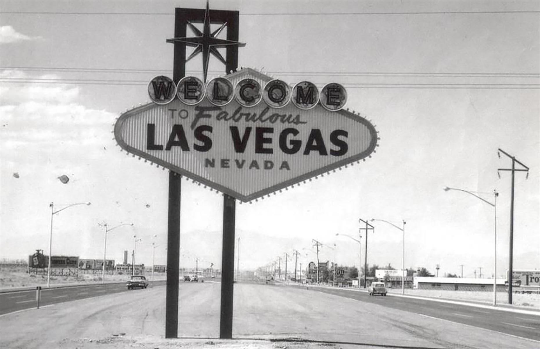 Slide 20 of 34: Today the Welcome to Fabulous Las Vegas sign is recognized all over the world. The original sign (there are three replicas) stands at what is considered the southern end of the Las Vegas Strip. The sign was built and installed in 1959 by Western Neon and it was designed by Betty Willis, an employee of the company. She considered it a gift to the city so there is no copyright on it. Funnily enough, it's never marked the actual city limits of Las Vegas. Even today it sits around four miles (6km) from the actual city of Las Vegas.