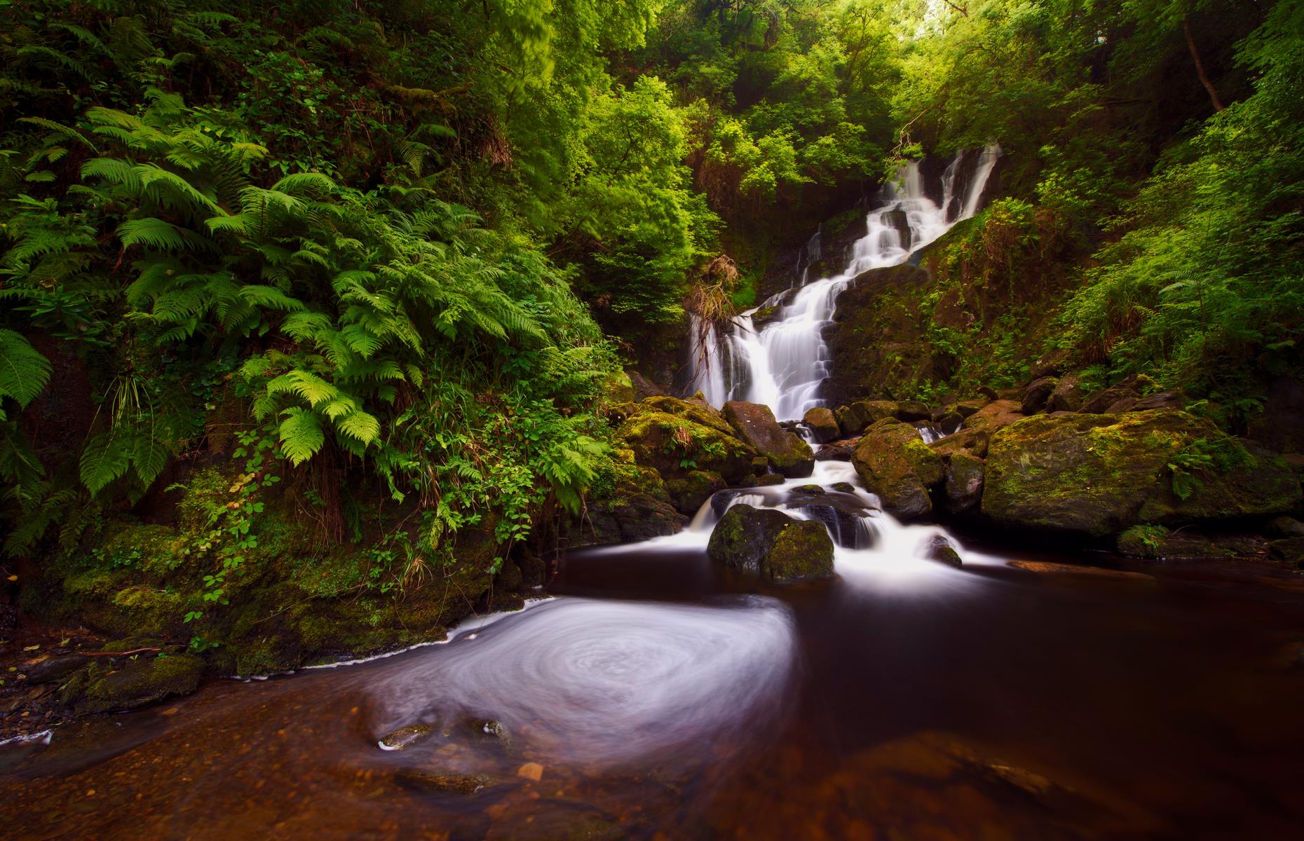 <p>Vibrant valleys, mystical lakes and densely-forested mountains define Ireland’s Killarney National Park, established 1832. It’s found in the southwest of the county, 90 minutes from Cork, and covers 40 square miles (104sq km). People usually head here to conquer Ireland’s tallest mountain range, the MacGillycuddy's Reeks. Elsewhere, the serenity of Upper, Muckross and Lough Leane lakes can be enjoyed, along with the magic of the 66-foot (20m) high Torc Waterfall.</p>