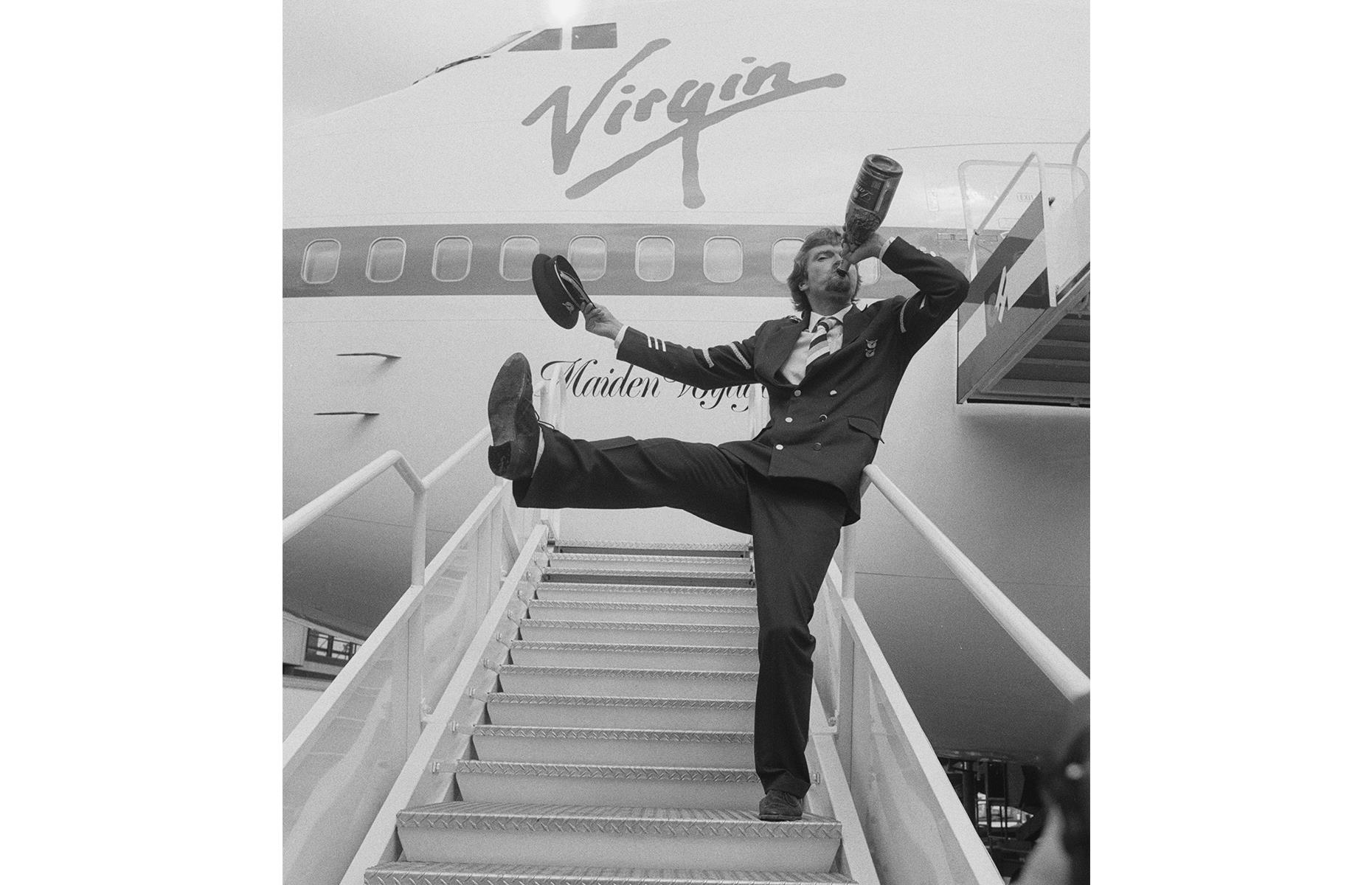 Balancing out the rise of the low-cost carrier, Virgin Atlantic Airways was also launched in this decade. Branson's mission was to pay homage to the golden era of travel by elevating the experience of flying once more, offering passengers a luxurious but not unattainable journey. On 22 June 1984, Branson celebrates the launch of his new airline.