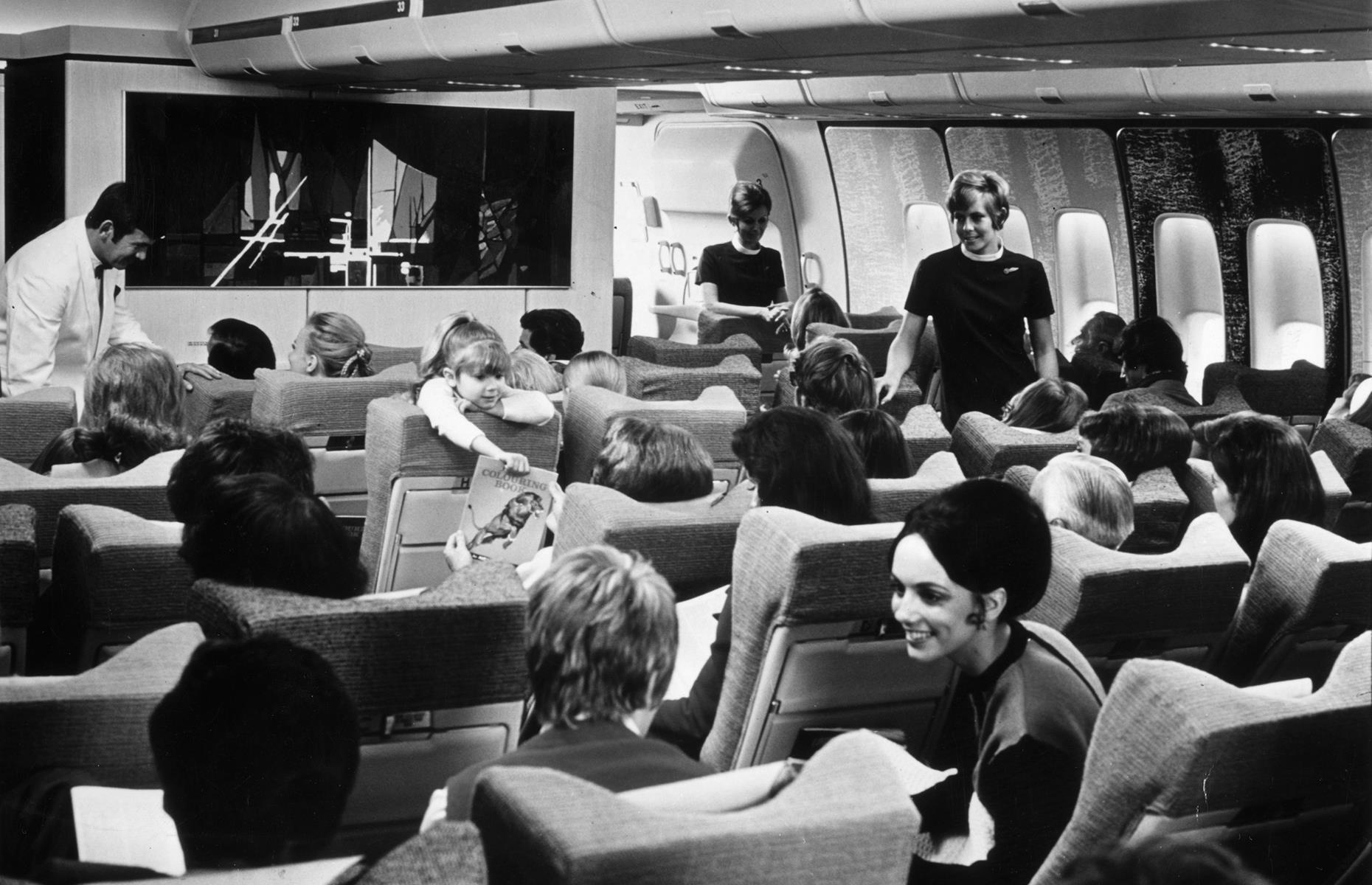 This was the first time that air travel was truly opening up to the masses. Since planes were larger, airlines were able to hold more passengers and therefore sell more tickets at a reduced price. Though flying still wasn't cheap, it was no longer only reserved for the super-rich. This 1970s shot shows the spacious cabin of a BOAC Boeing 747, filled with families, couples and other vacationers.