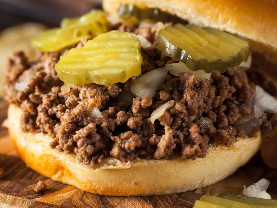 <p>This state is home to the tavern or "loose meat" sandwich. It's made with unseasoned ground beef, sauteed onions, and sometimes topped with pickles, ketchup, or mustard on a bun.</p>