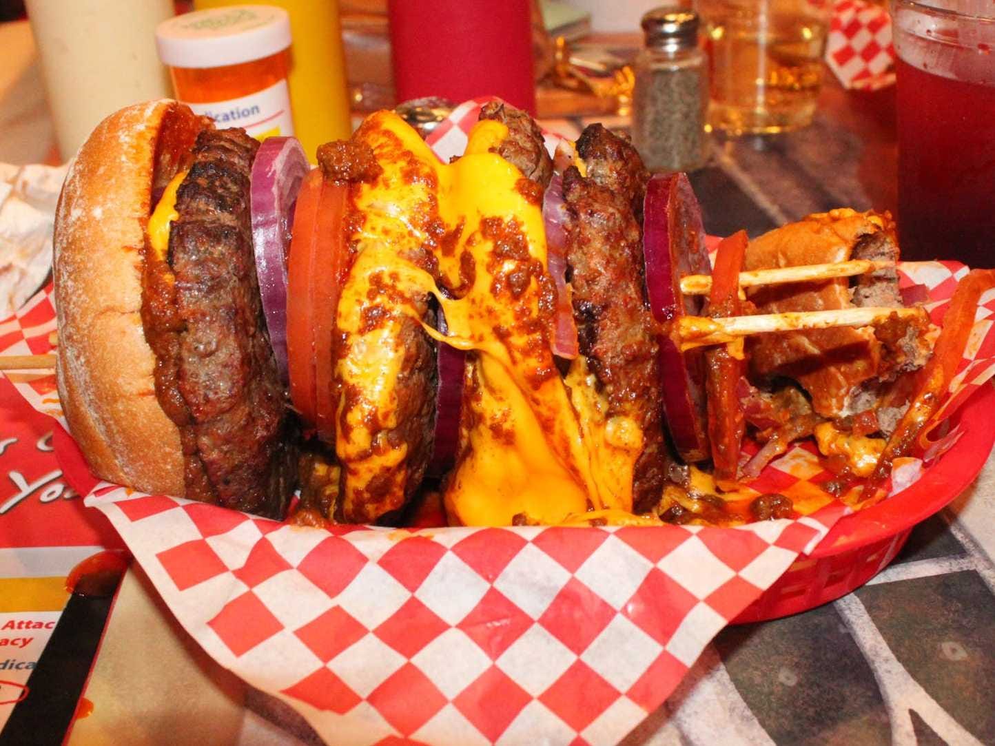 <p>Las Vegas' <a href="https://www.heartattackgrill.com/">Heart Attack Grill</a> is periodically in the news for its calorific burgers. Some variations contain five burger patties with bacon and, of course, a side of fries.</p>