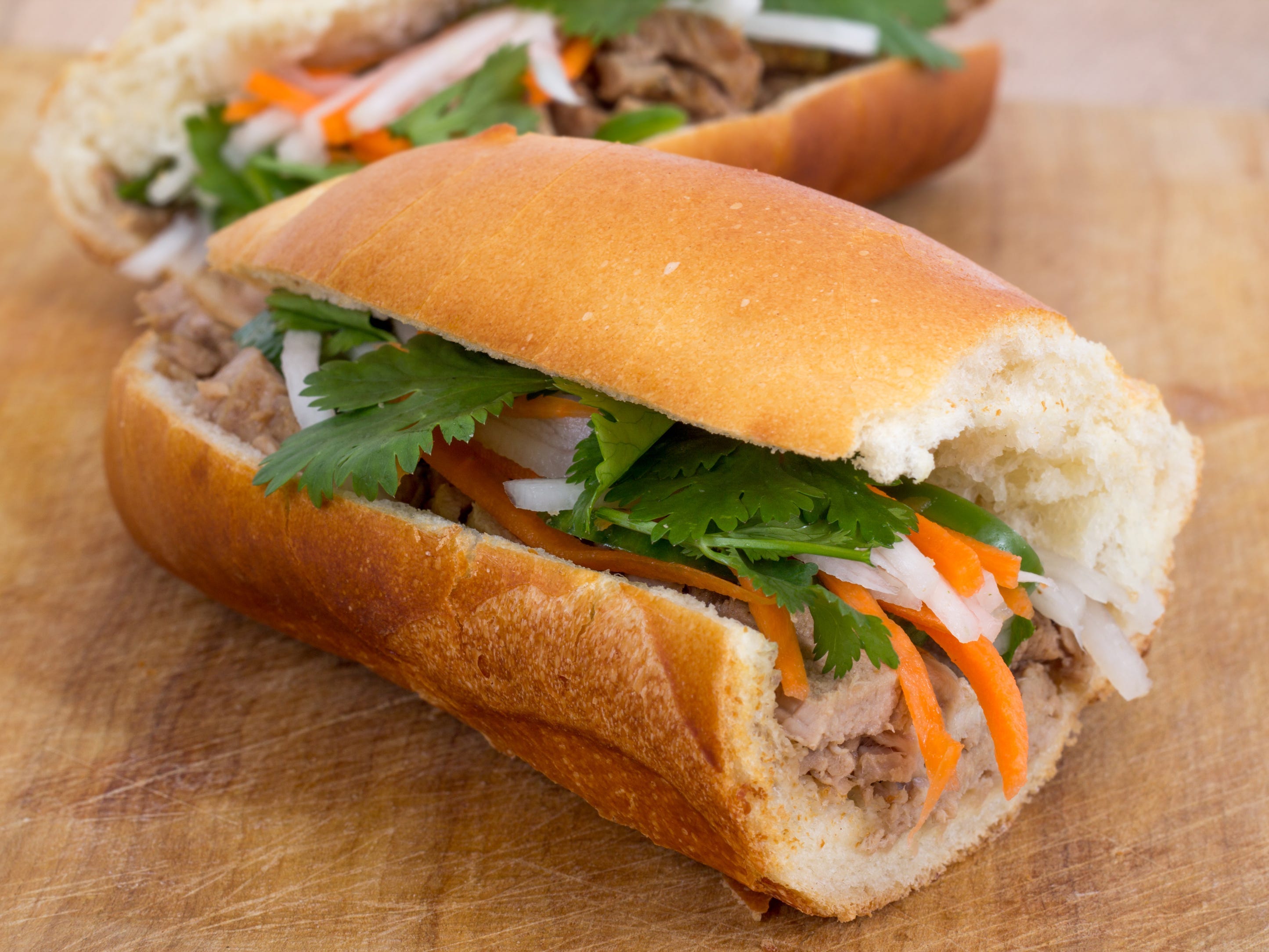 <p>Seattle has a large Vietnamese community and is home to some of the best bánh mì sandwiches in America. The inexpensive staple is usually made with pate, bright, crunchy vegetable slaw, fish sauce, and sliced jalapeño pepper or fresh cilantro.</p>