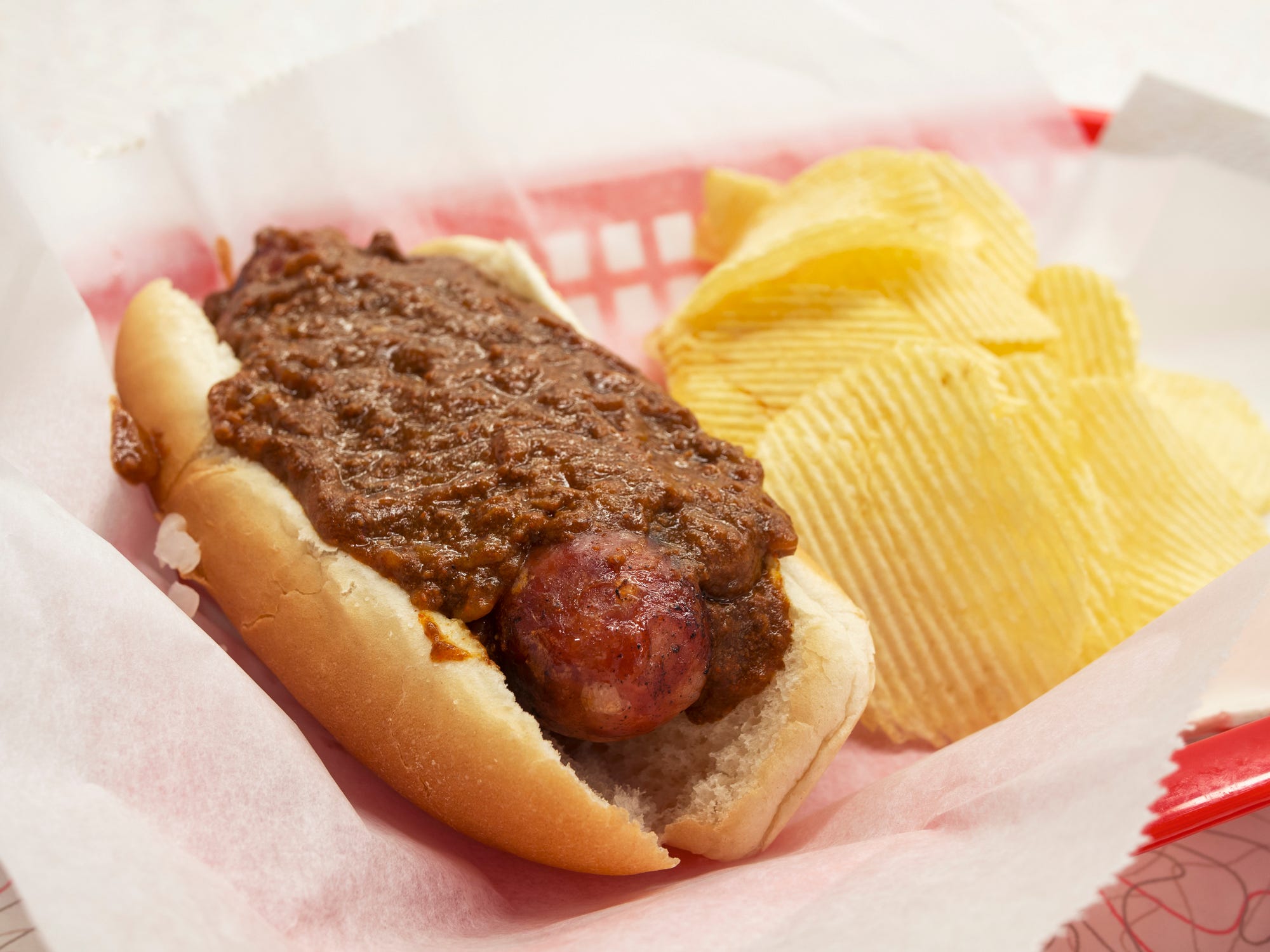 <p>Stop into Ben's Chili Bowl and order a chili half-smoke, a half pork, half beef smoked sausage served on a warm steamed bun with mustard, onions, and spicy homemade chili sauce.</p>