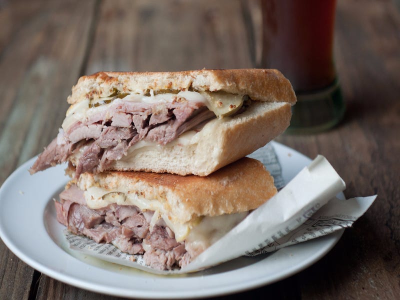 <p>The sunshine state is known for its Cuban sandwich with generous portions of ham, roasted pork, Swiss cheese, pickles, and mustard, all on two slices of Cuban bread.</p>
