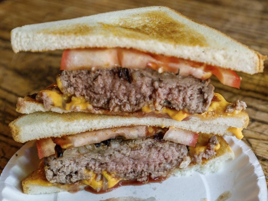 <p>Connecticut is known for its non-traditional hamburgers, which are served on white toast with a choice of onion, tomato, or cheese, but no condiments. Try one at Louis' Lunch in New Haven.</p>