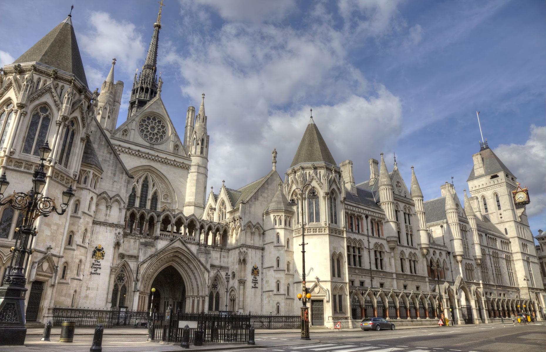 London's Royal Courts of Justice building, which was opened by Queen Victoria in 1882, was designed by George Edmund Street, one of the leading figures in the Victorian Gothic Revival movement, hence the medieval cathedral-like turrets and church-inspired windows.