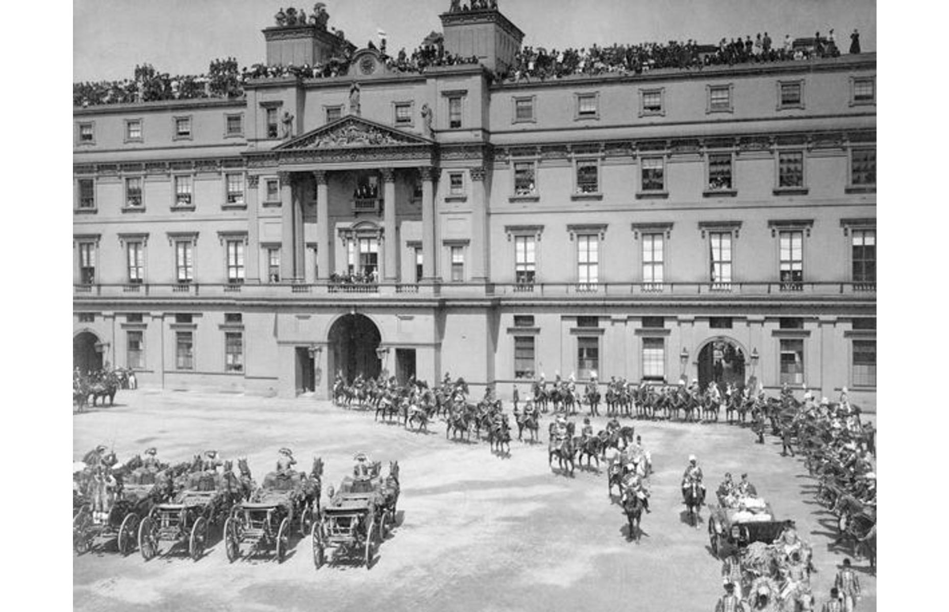 <p>Shown here during Queen Victoria’s Diamond Jubilee in 1897, Buckingham Palace is one of the UK’s most famous landmarks and has served as an official residence of the Royal Family since 1837, remaining the administrative headquarters of the Queen today. The palace, which has 775 rooms and is set among 39 acres of grounds, has held public tours every summer since 1993. Another popular event with visitors is the daily Changing of the Guards ceremony outside the Palace gates, although it is <a href="https://changing-guard.com/dates-buckingham-palace.html">currently suspended</a> due to COVID-19.</p>