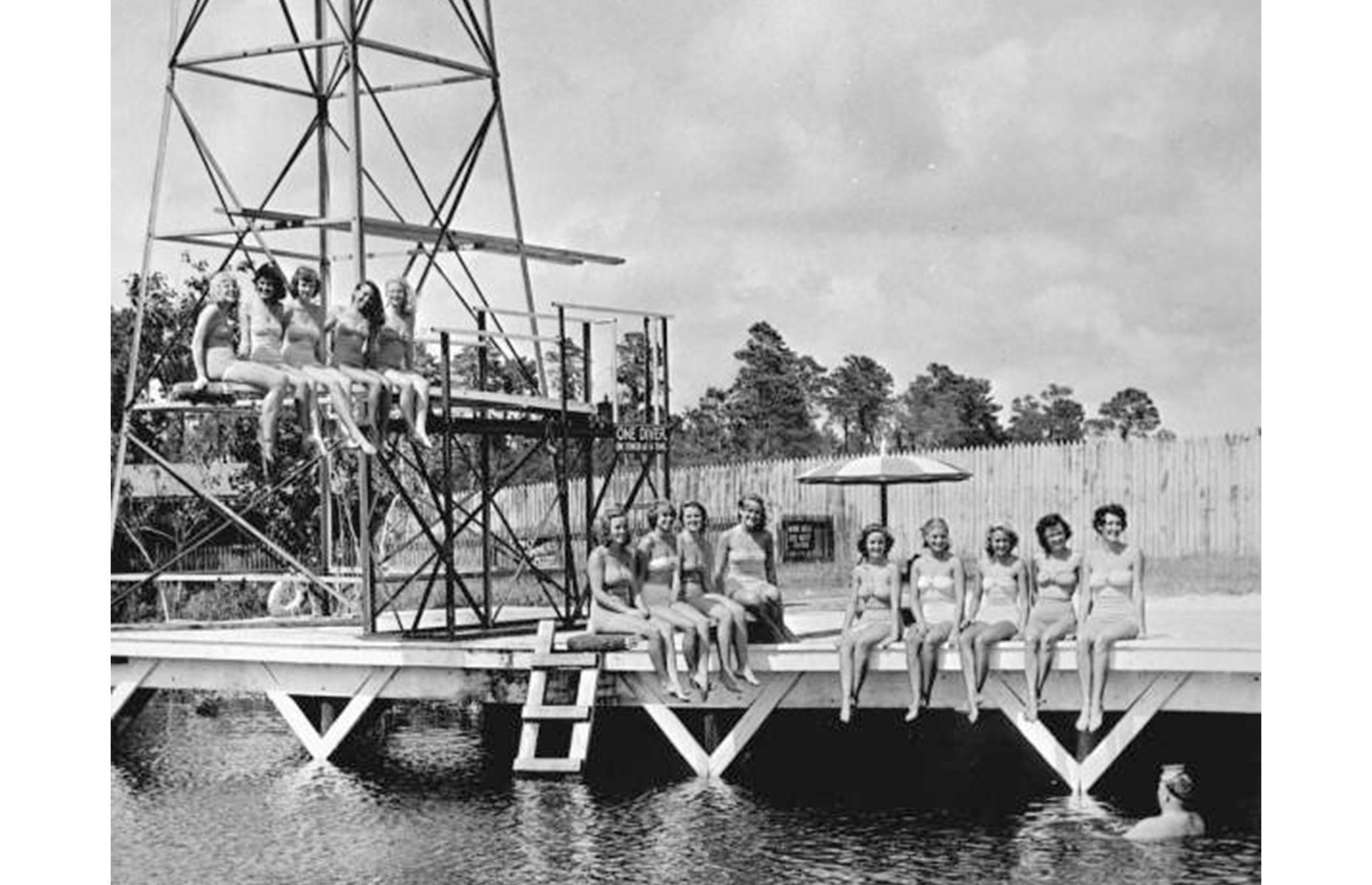 <p>Weeki Wachee is one of the deepest natural springs in the US, but the attraction has become well-known for its popular mermaid shows which have taken place since the 1940s. These involve real-life “mermaids” swimming up to 16 feet (5m) below the surface to perform impressive synchronized dances. Pictured here in 1949 are some mermaids cooling off at the dock between shows. Today, the site has grown to include a water park, riverboat rides and casual restaurants.</p>