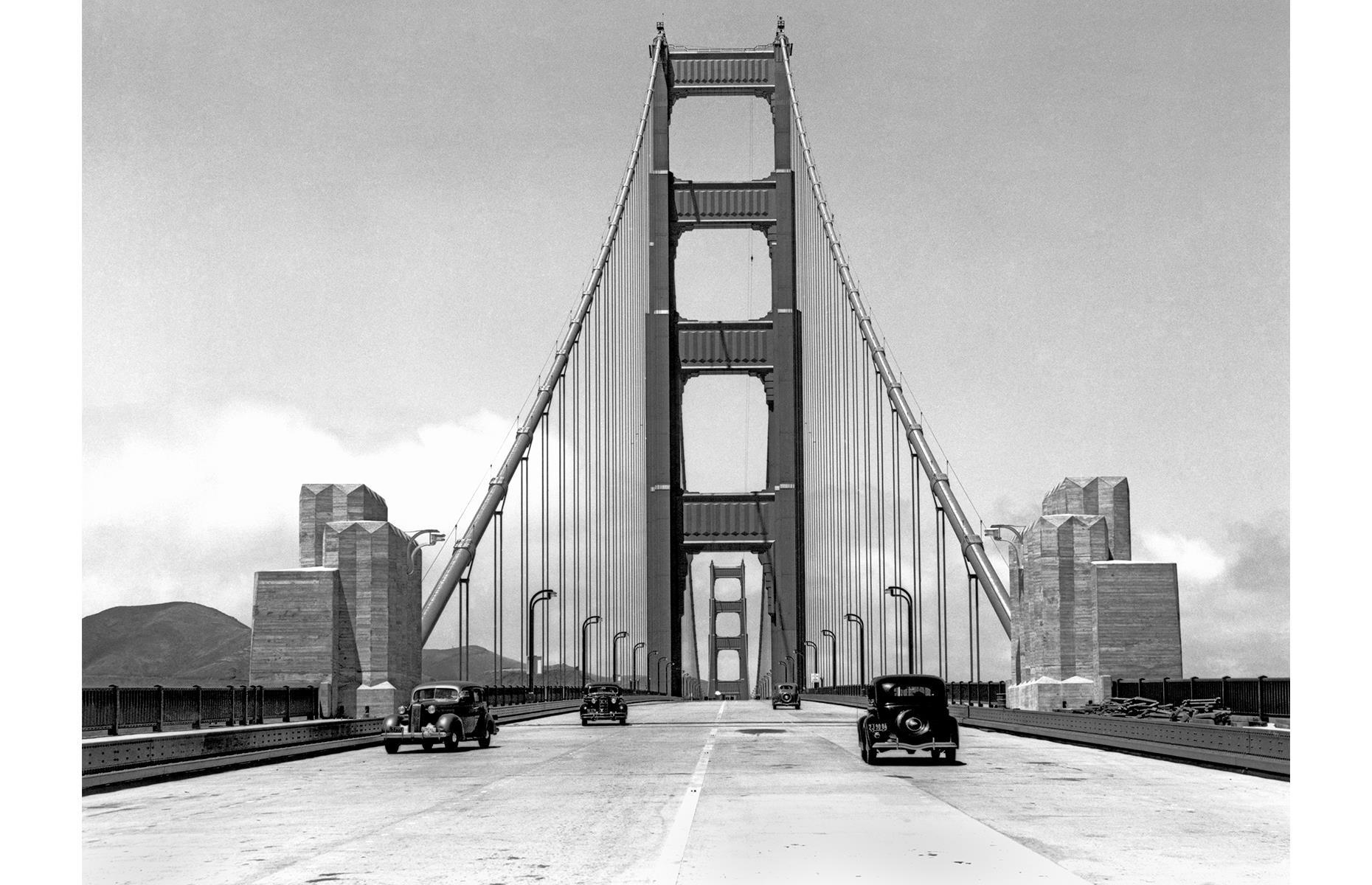 <p>The red-orange Golden Gate Bridge has spanned its namesake strait since 1937, and at the time it was the longest and tallest suspension bridge in the world. Pictured here on 24 May 1937, a few days before its official opening date, a small number of journalists were allowed to cross the bridge. Today, the bridge is crossed by 100,000 vehicles per day. <a href="https://www.loveexploring.com/gallerylist/71687/the-most-impressive-bridge-in-every-us-state-and-dc">These are the most impressive bridges in every state and DC</a>.</p>