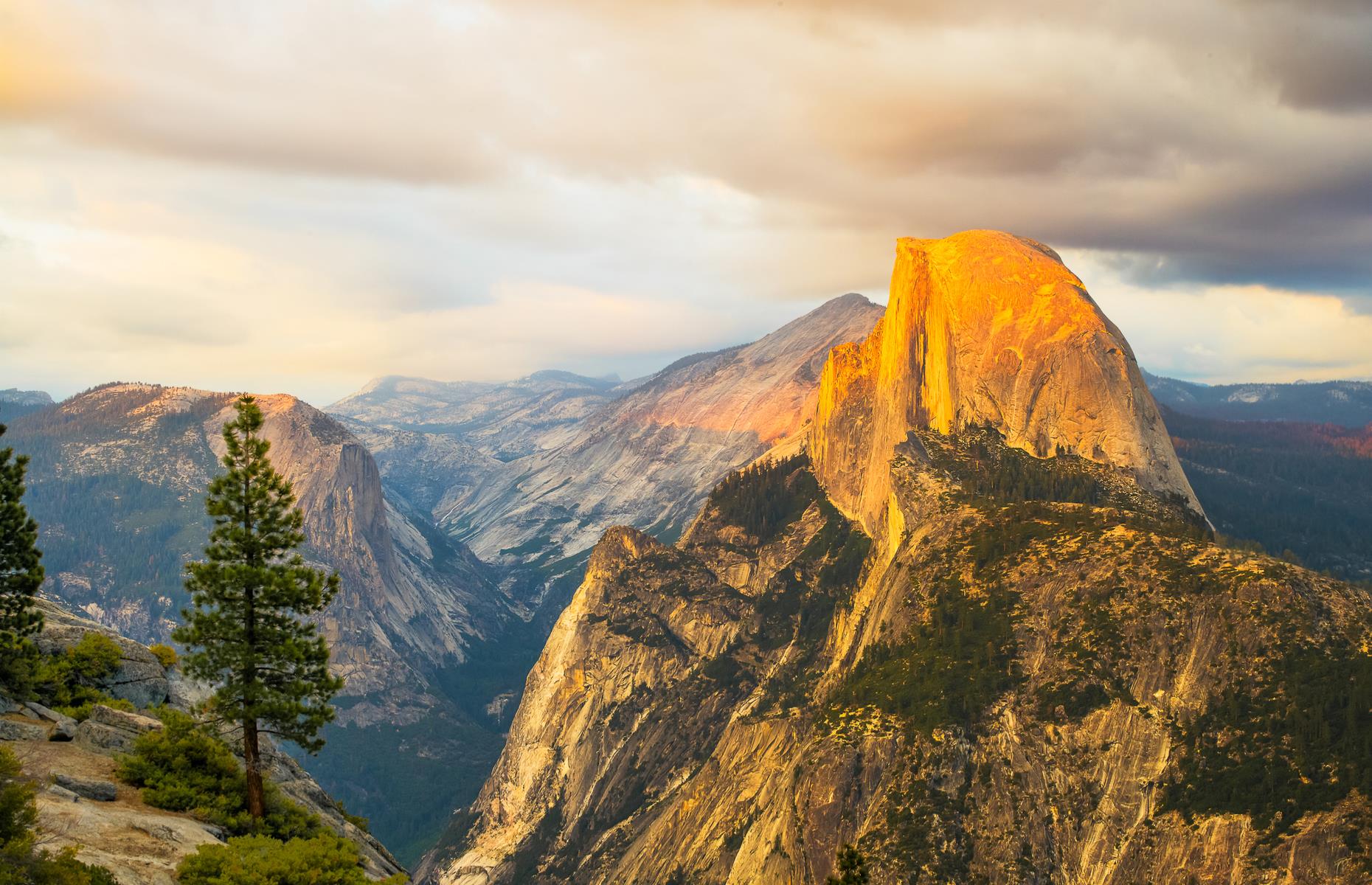 Slide 18 of 49: There's little wonder Yosemite's Half Dome (pictured) draws the crowds: rising 5,000-feet (1,524m) over the Yosemite Valley it makes for a dizzying hike and offers fabulous views. The national park and its mighty peak are likely to be quieter than normal since a temporary day-use reservation system is in place – but if you'd still rather avoid it, there are plenty of other unique bluffs to be found in America's West. 