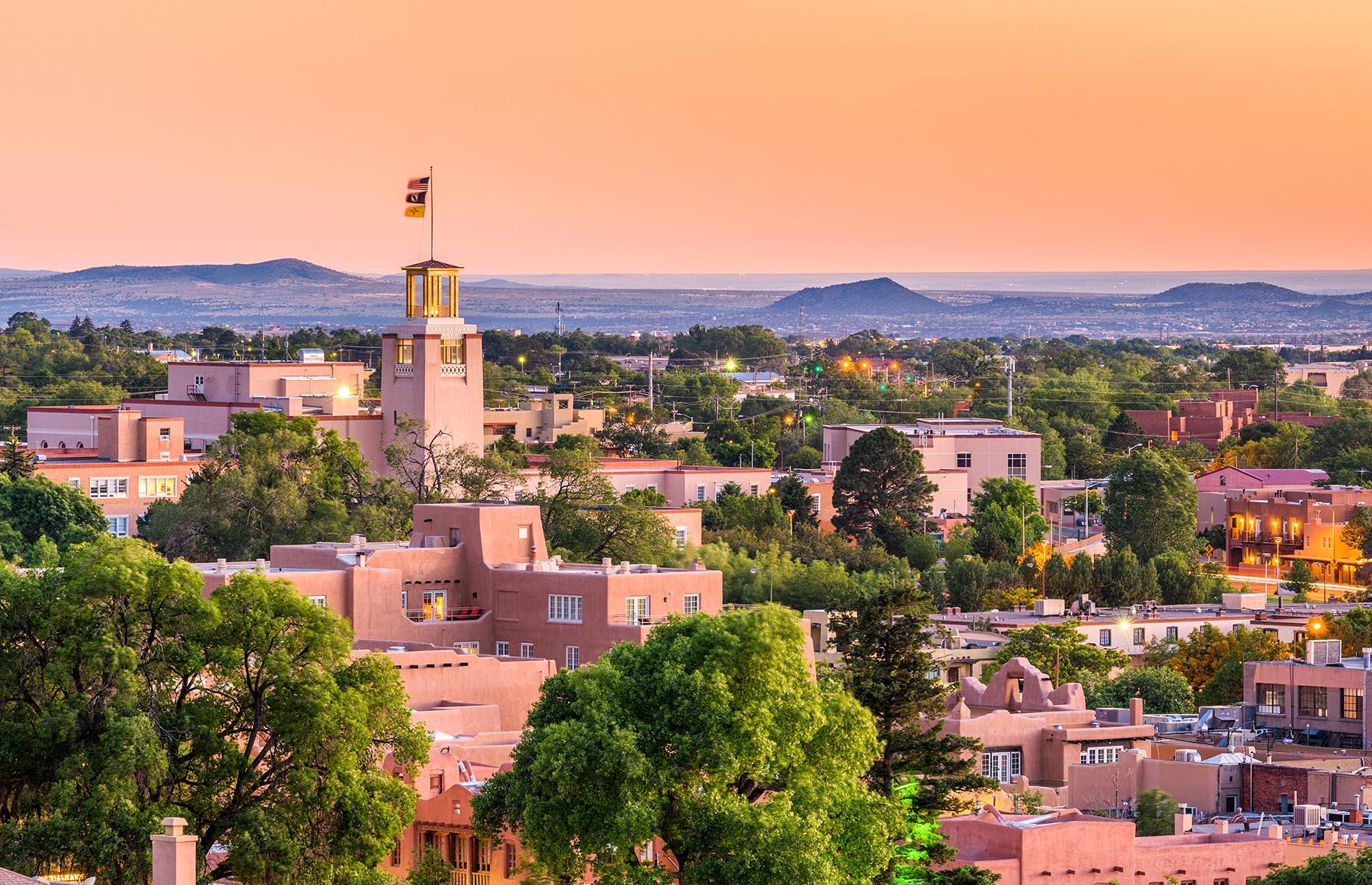 <p>The capital of New Mexico, the mountain town of Santa Fe may look different to a skyscraper-heavy city with its Pueblo-style architecture and winding streets, but it certainly has a lot going on. Culturally, there are 14 museums and over 250 galleries, as well as 10 different art markets and festivals. It’s also got a distinct regional cuisine, descending from years of Indigenous American, Spanish and Anglo influences, that's manifested in more than 400 restaurants. Check out <a href="https://santafe.org/Santa_Fe_Reopening/index.html">the latest travel advice here</a>.</p>