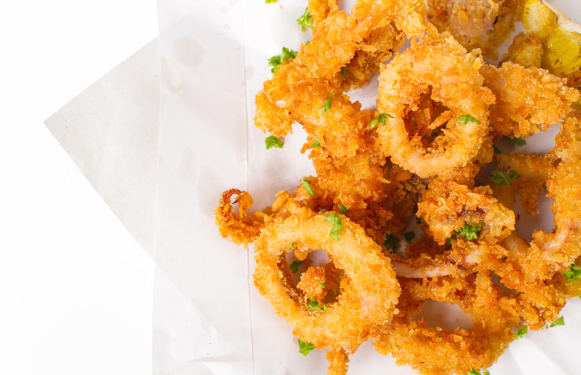 <p>America’s smallest state punches above its weight when it comes to delicious produce and it’s especially famed for seafood fresh from the Atlantic and pulled in daily by local fishing boats. Specifically, it’s known for small, sweet, delicate-tasting squid, served battered and fried in bite-size pieces. Calamari became the <a href="https://www.towndock.com/blog/calamari-becomes-rhode-islands-official-state-appetizer">official state appetizer</a> in 2014, reflecting its popularity and importance to the economy.</p>