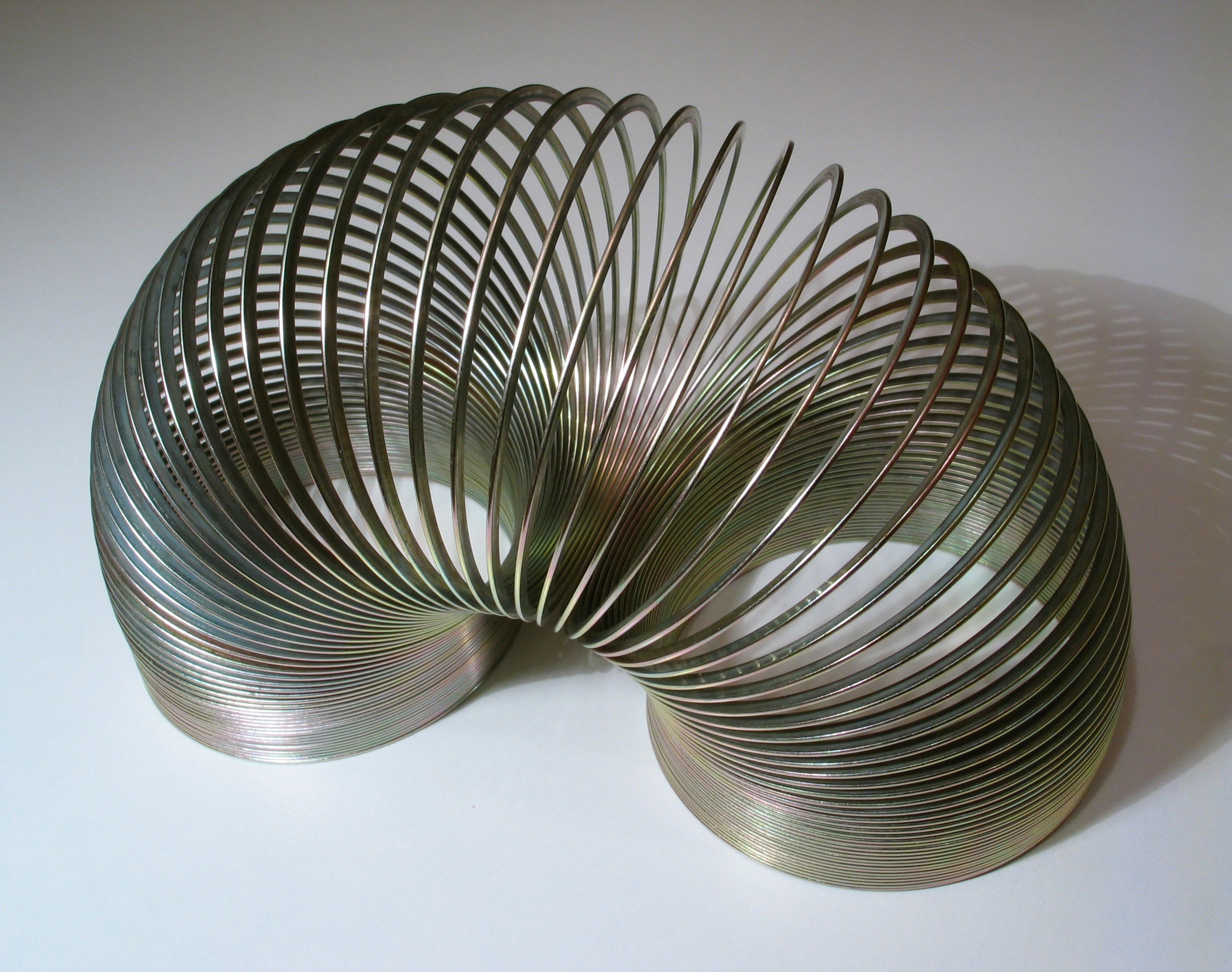 <p>As Ace Ventura pointed out, everyone loves a slinky. These classic coil toys continue to be made in the United States, and millions have been sold over the years. Slinkies are perhaps best-known for hopping down staircases all on their own, but their metallic properties have seen them turned into everything from science experiments to impromptu radio transmitters.</p>