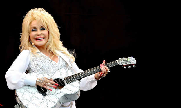 Slide 2 of 30: Many aren't aware that the song 'I Will Always Love You' was first written and performed by Dolly Parton. She wrote it in 1973, and it reached number one on the Billboard Hot Country Songs Chart twice in 1974 and again in 1982.